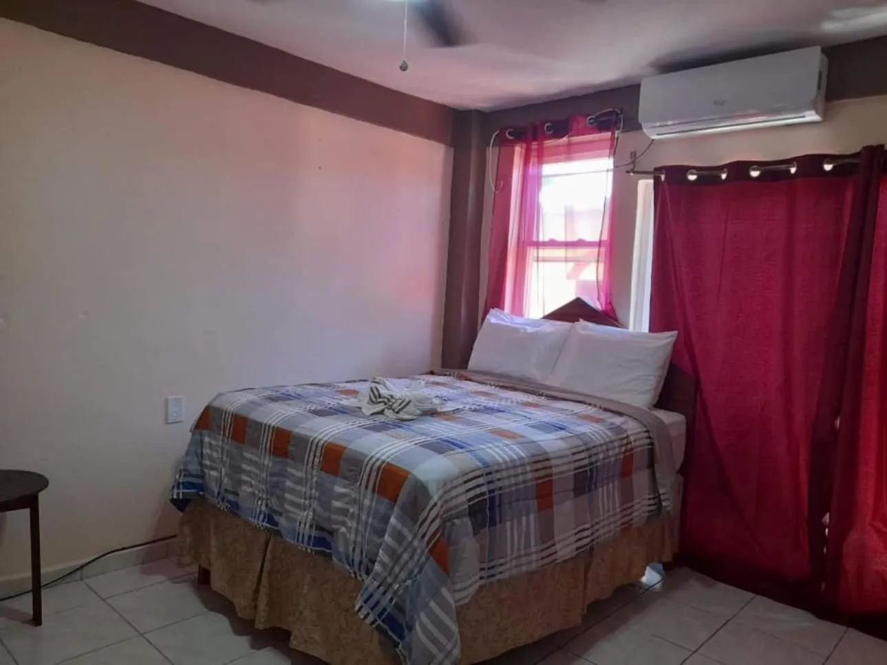 Bed in La Delphina Bed and Breakfast Bar and Grill