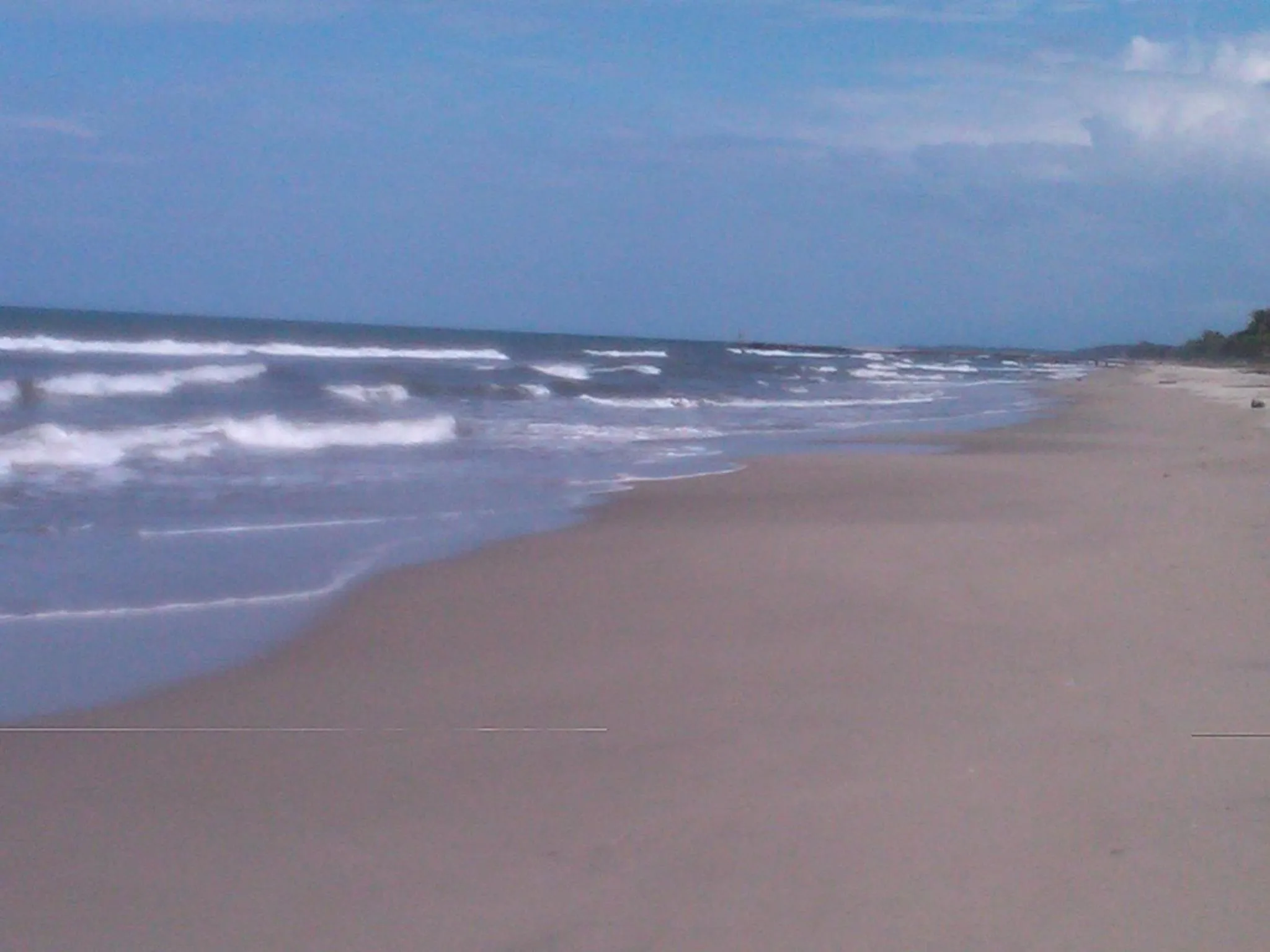 Beach in La Delphina Bed and Breakfast Bar and Grill