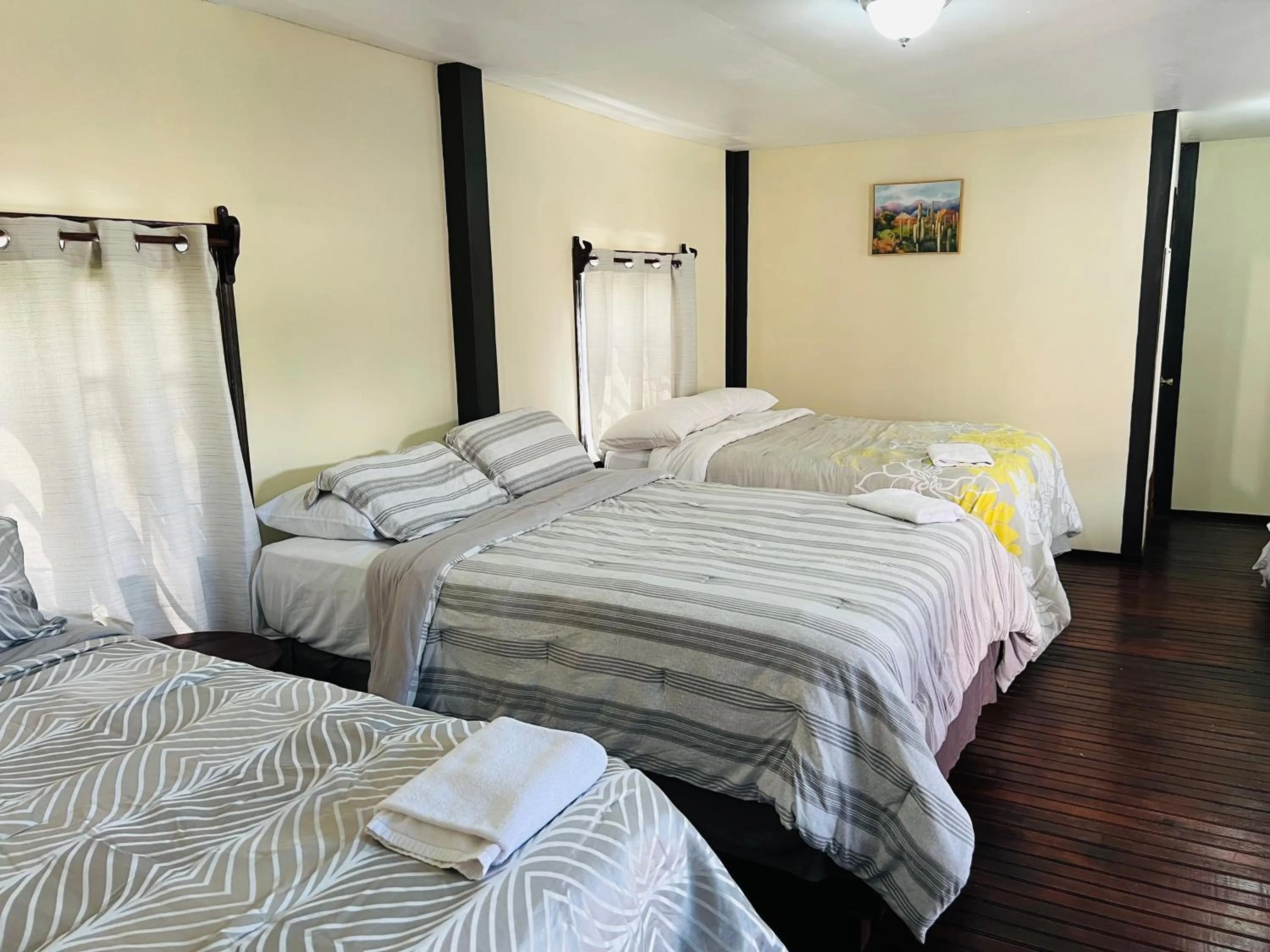 Bed in La Delphina Bed and Breakfast Bar and Grill