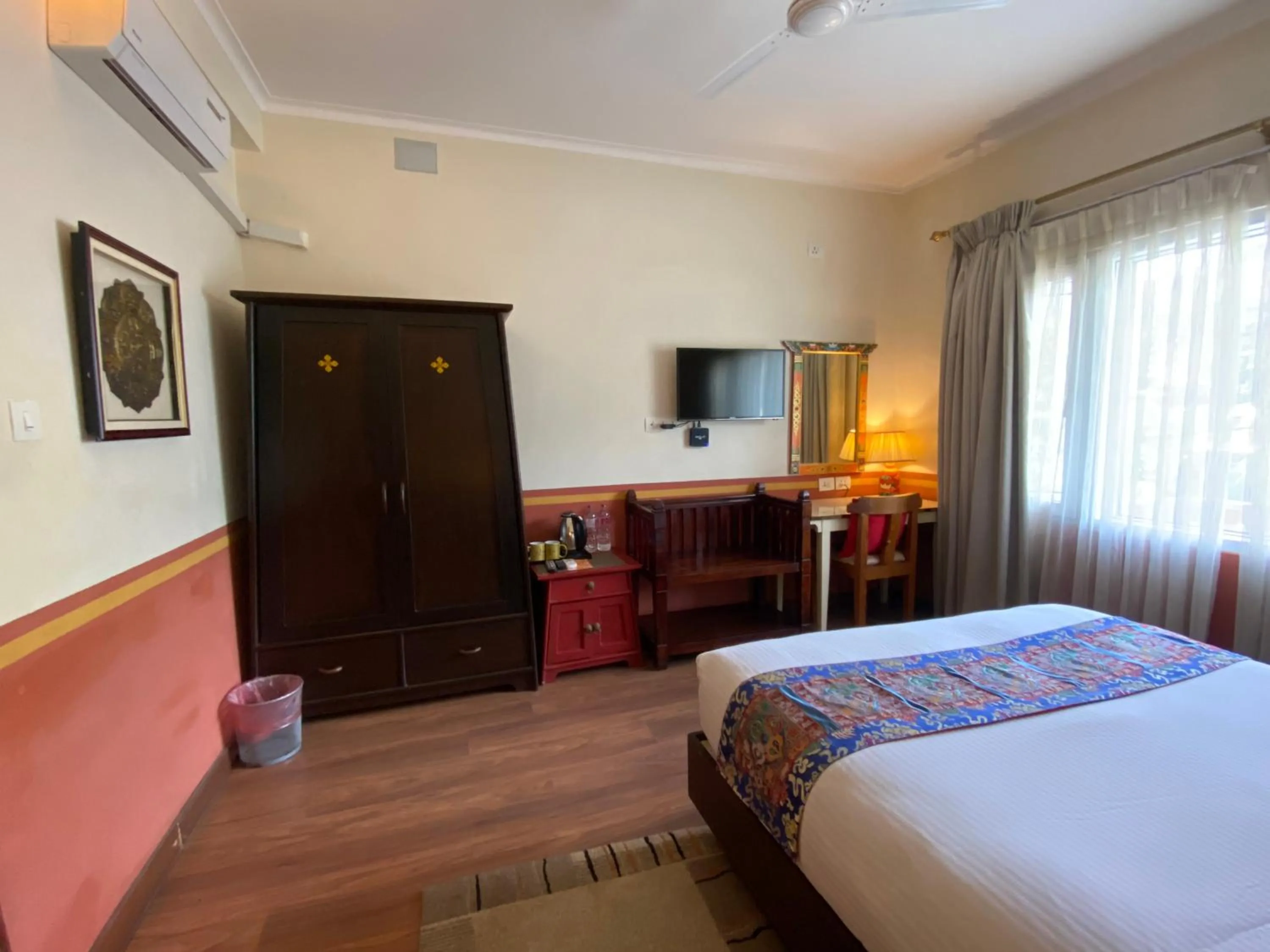 Bed in Three Jewels Boutique Hotel