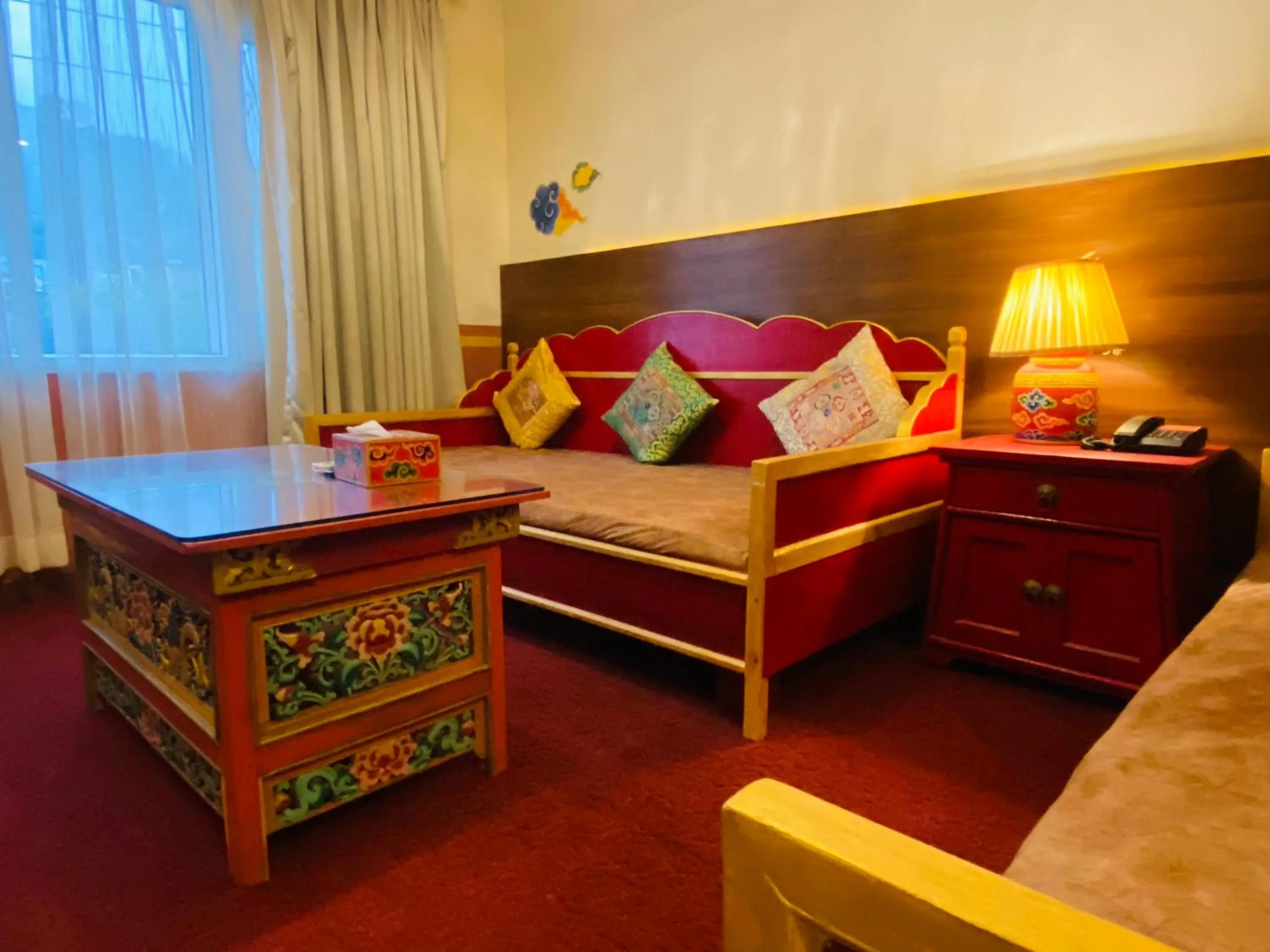 Bed in Three Jewels Boutique Hotel