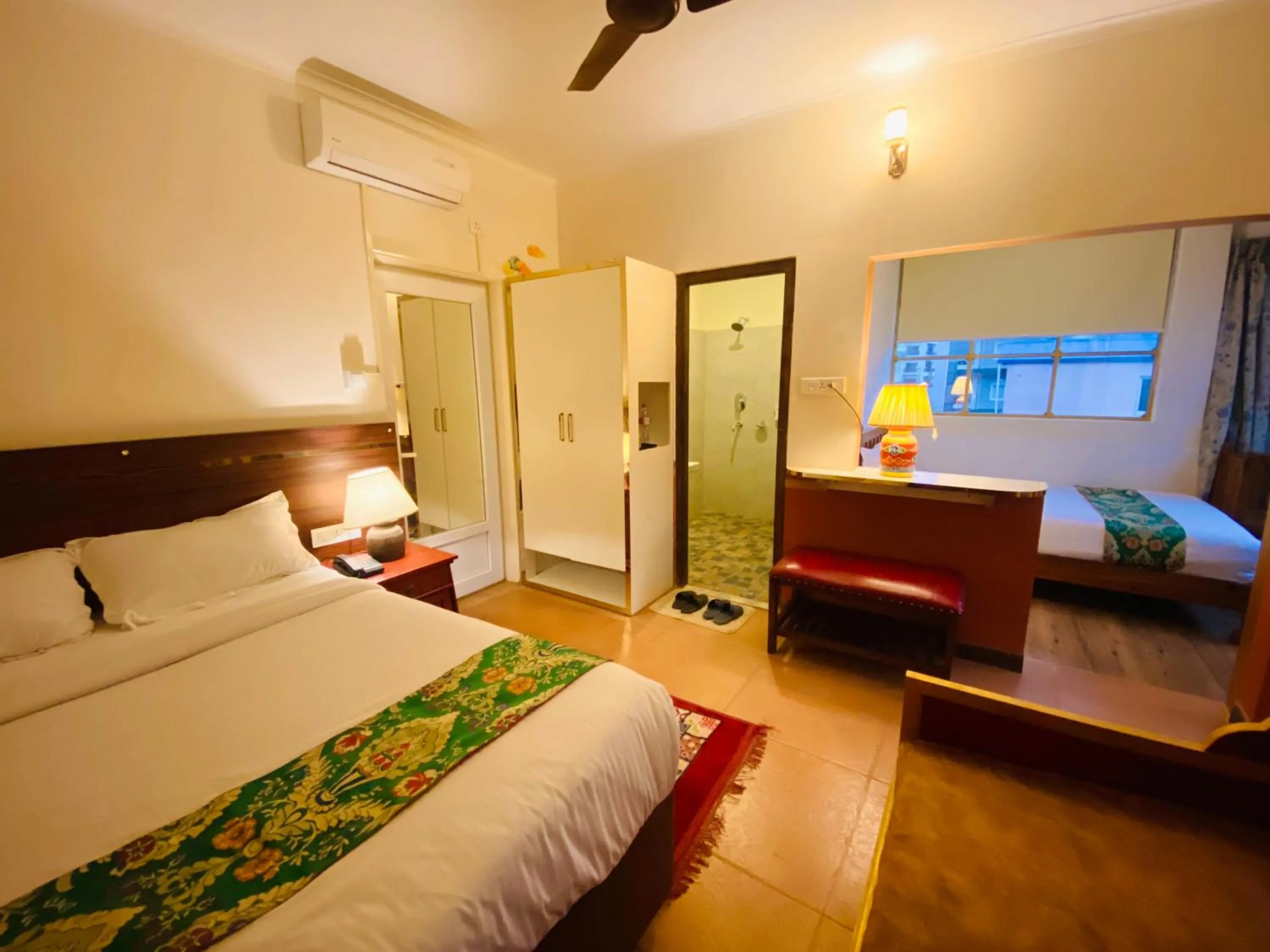 Bed in Three Jewels Boutique Hotel