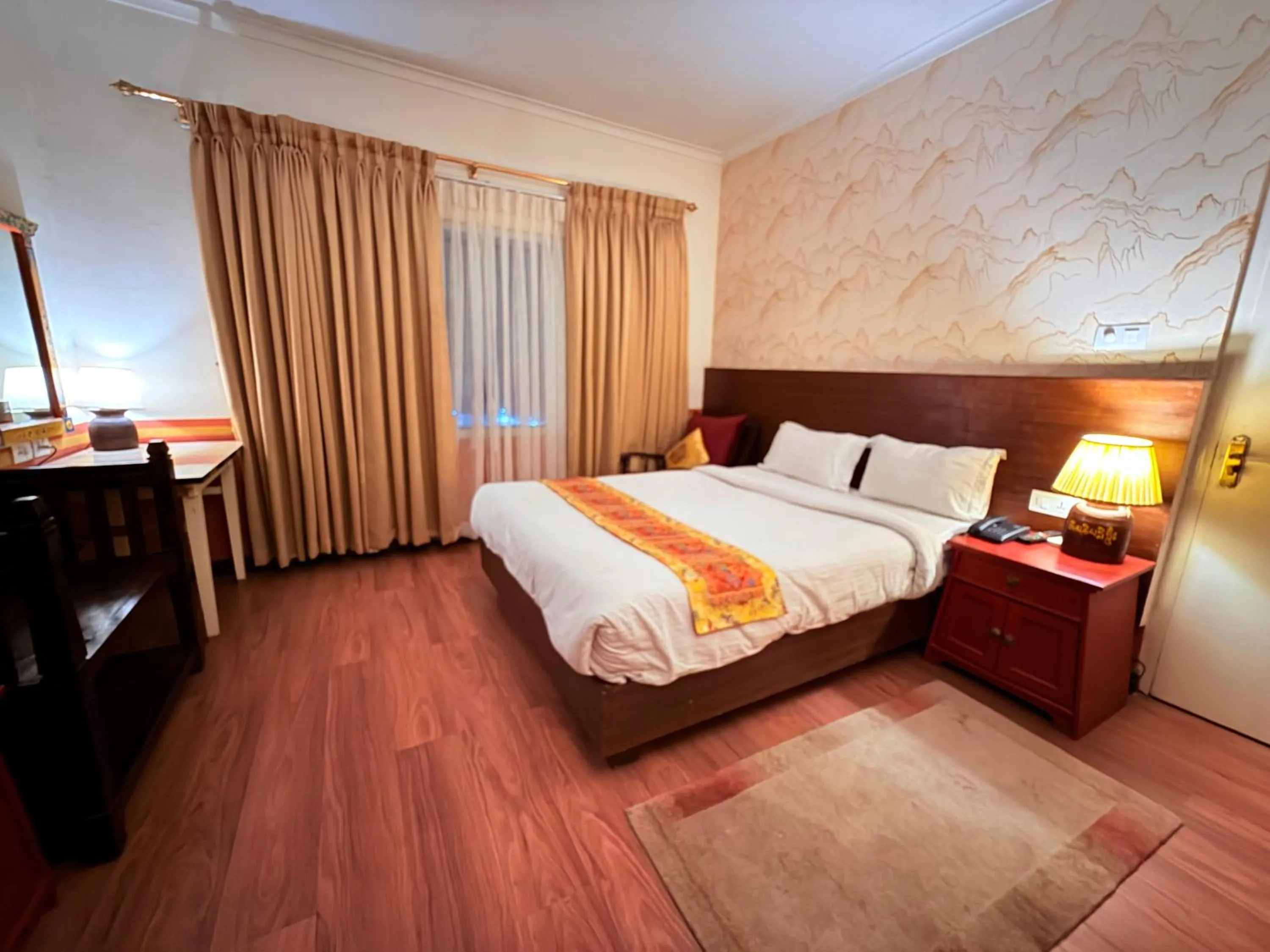 Bed in Three Jewels Boutique Hotel