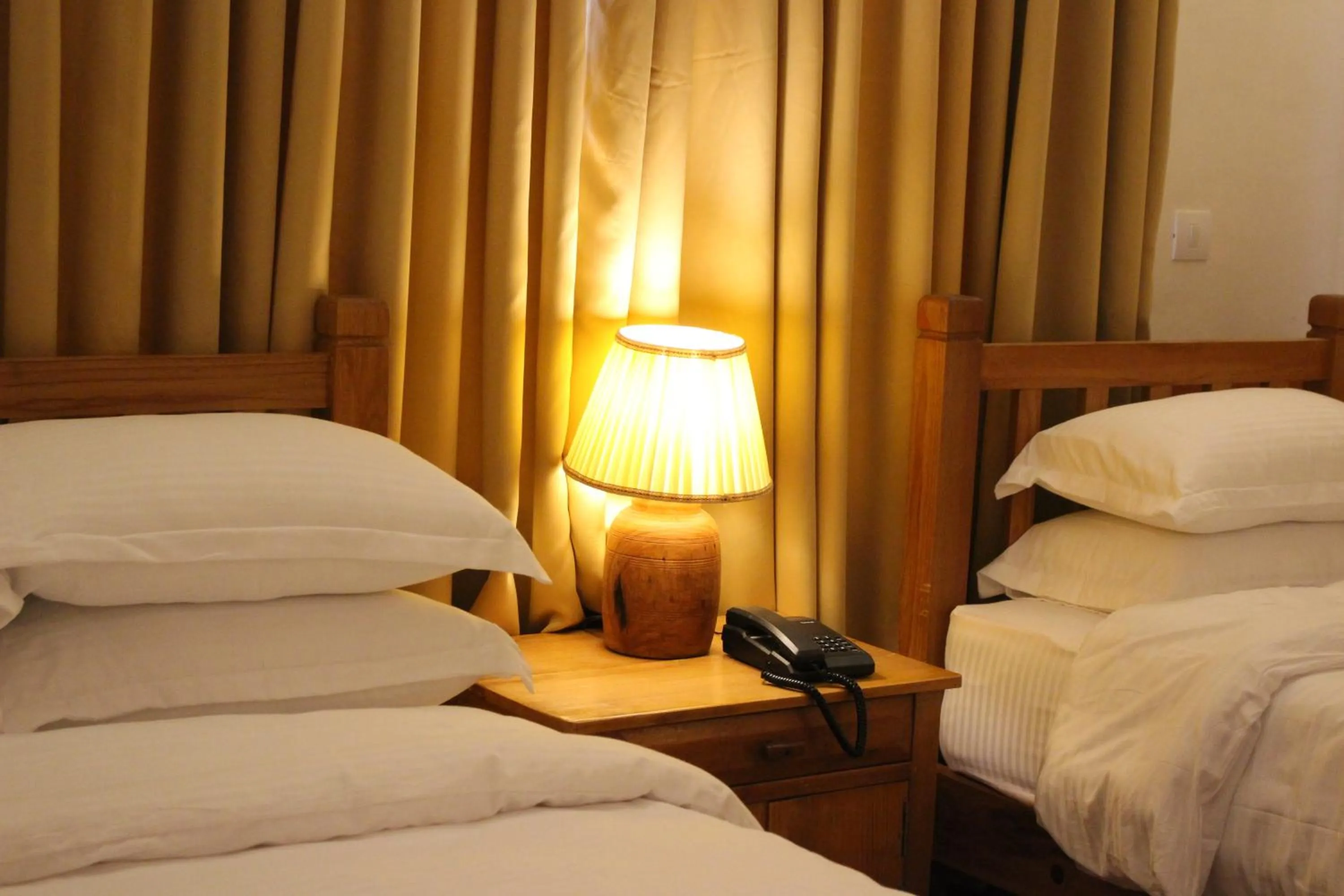 Bedroom, Bed in Three Jewels Boutique Hotel