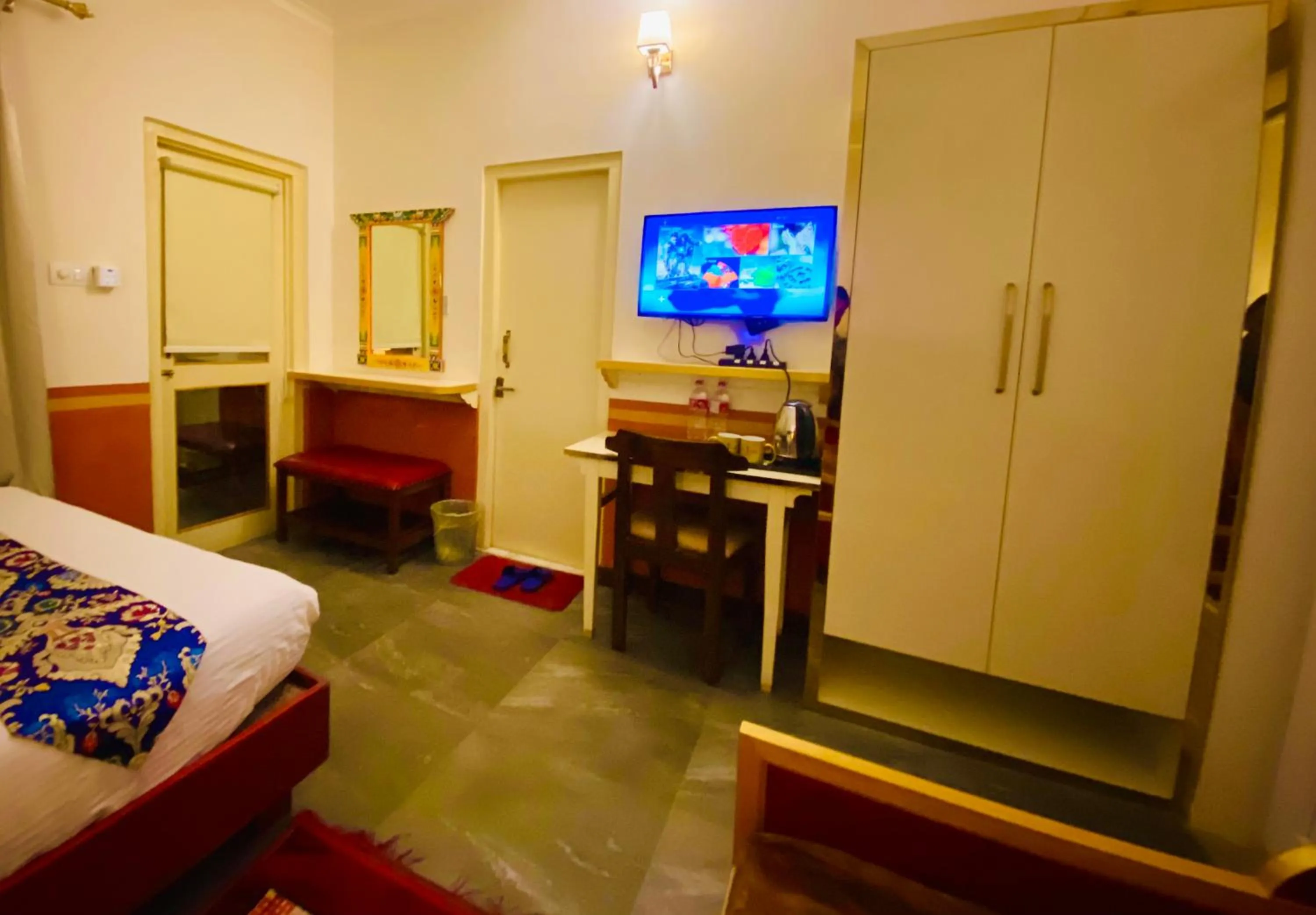 Bed in Three Jewels Boutique Hotel