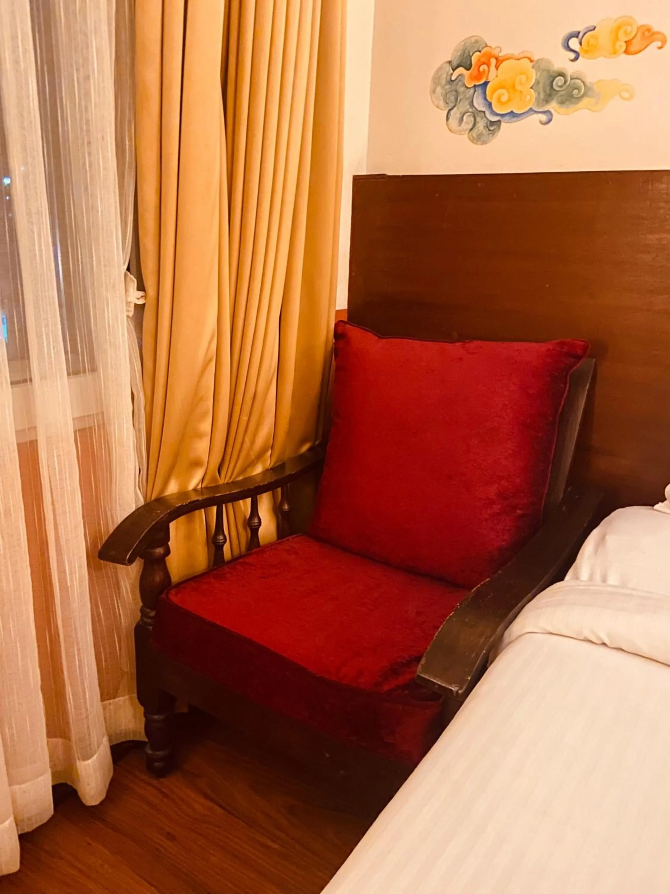 Bed in Three Jewels Boutique Hotel