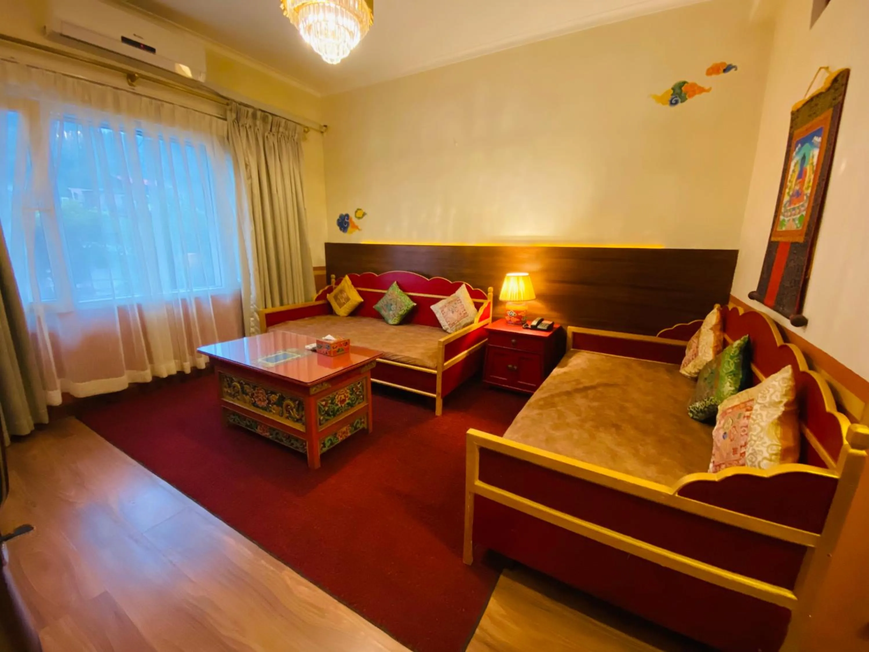 Bed in Three Jewels Boutique Hotel