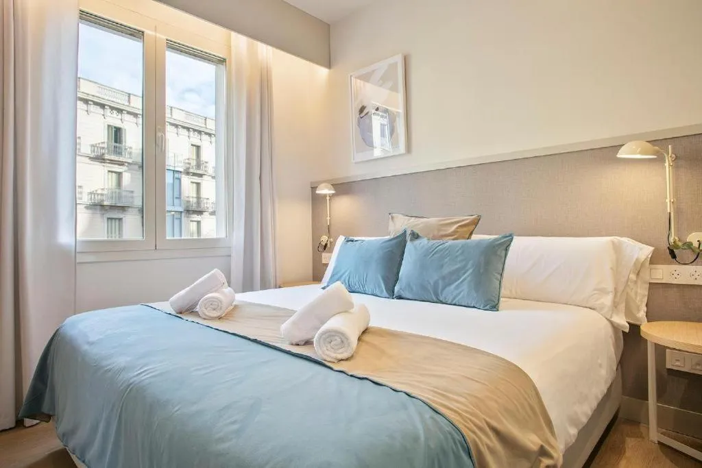 Bed in Fisa Rentals Ramblas Apartments