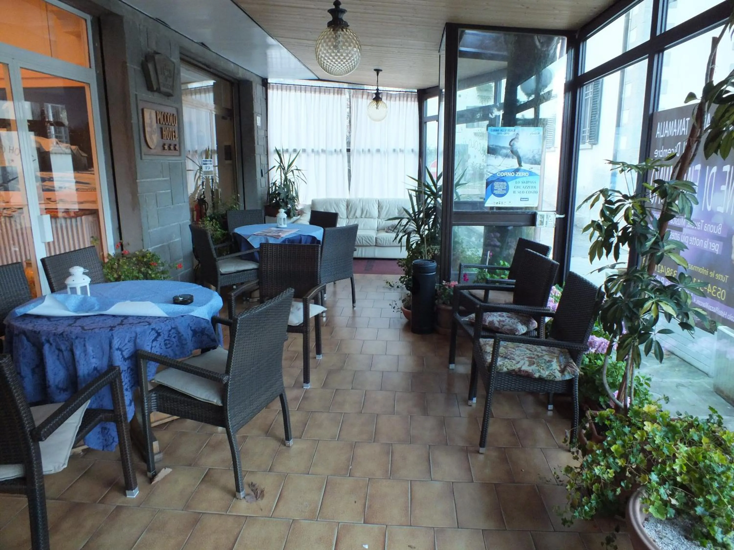 Communal lounge/ TV room in Piccolo Hotel