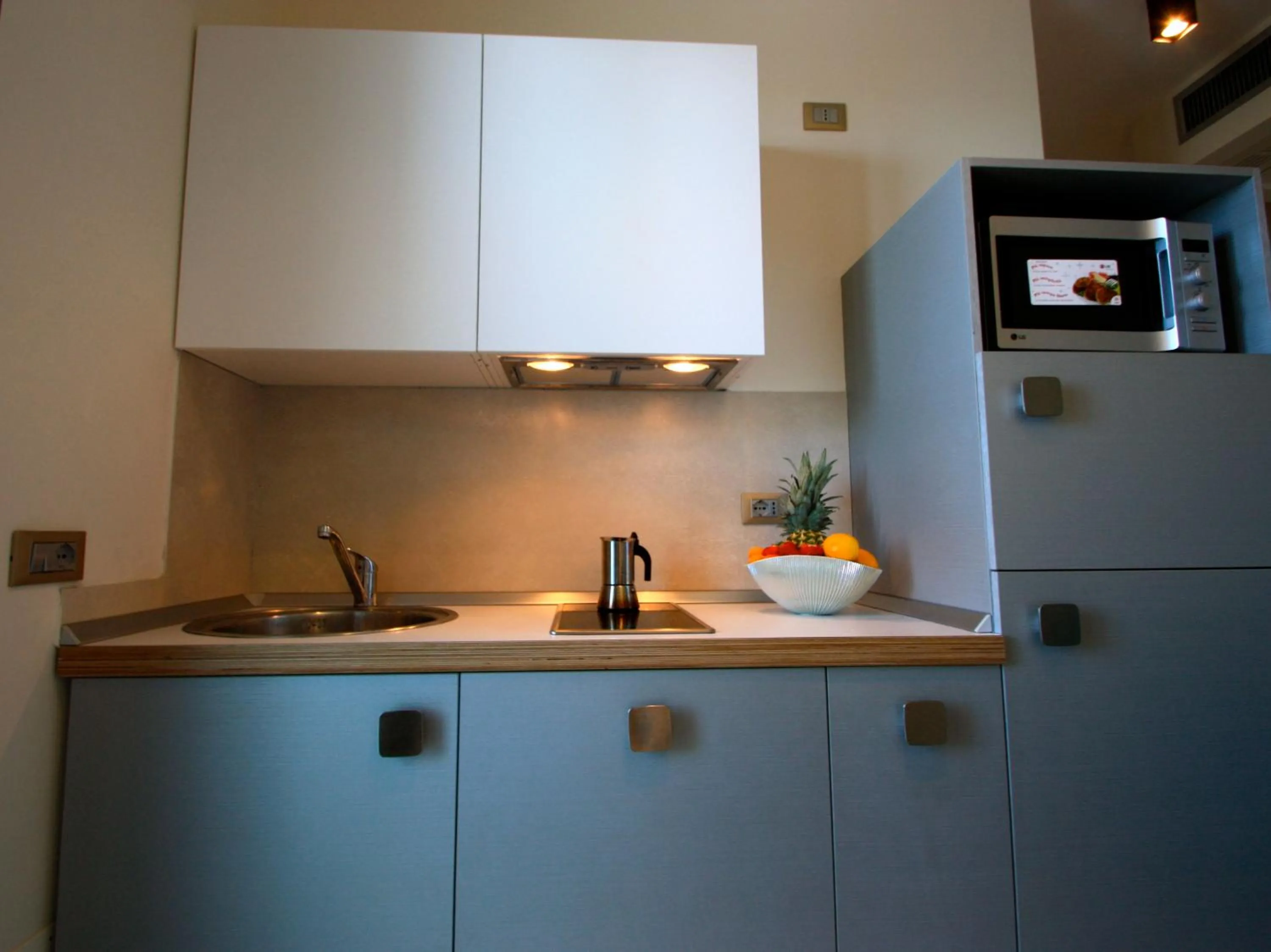 Kitchen or kitchenette in Hotel & Residence Cavalluccio Marino