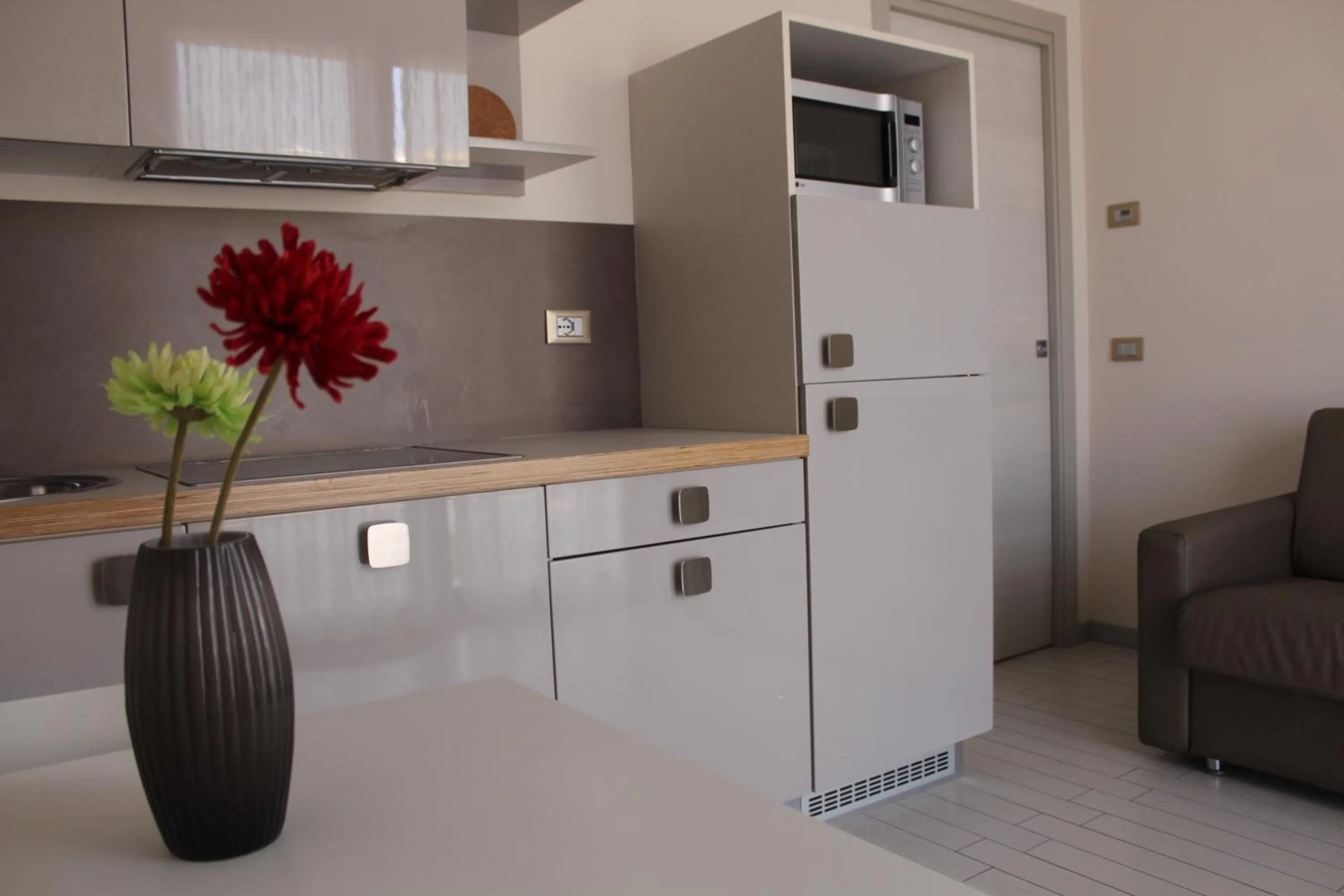 Kitchen or kitchenette in Hotel & Residence Cavalluccio Marino