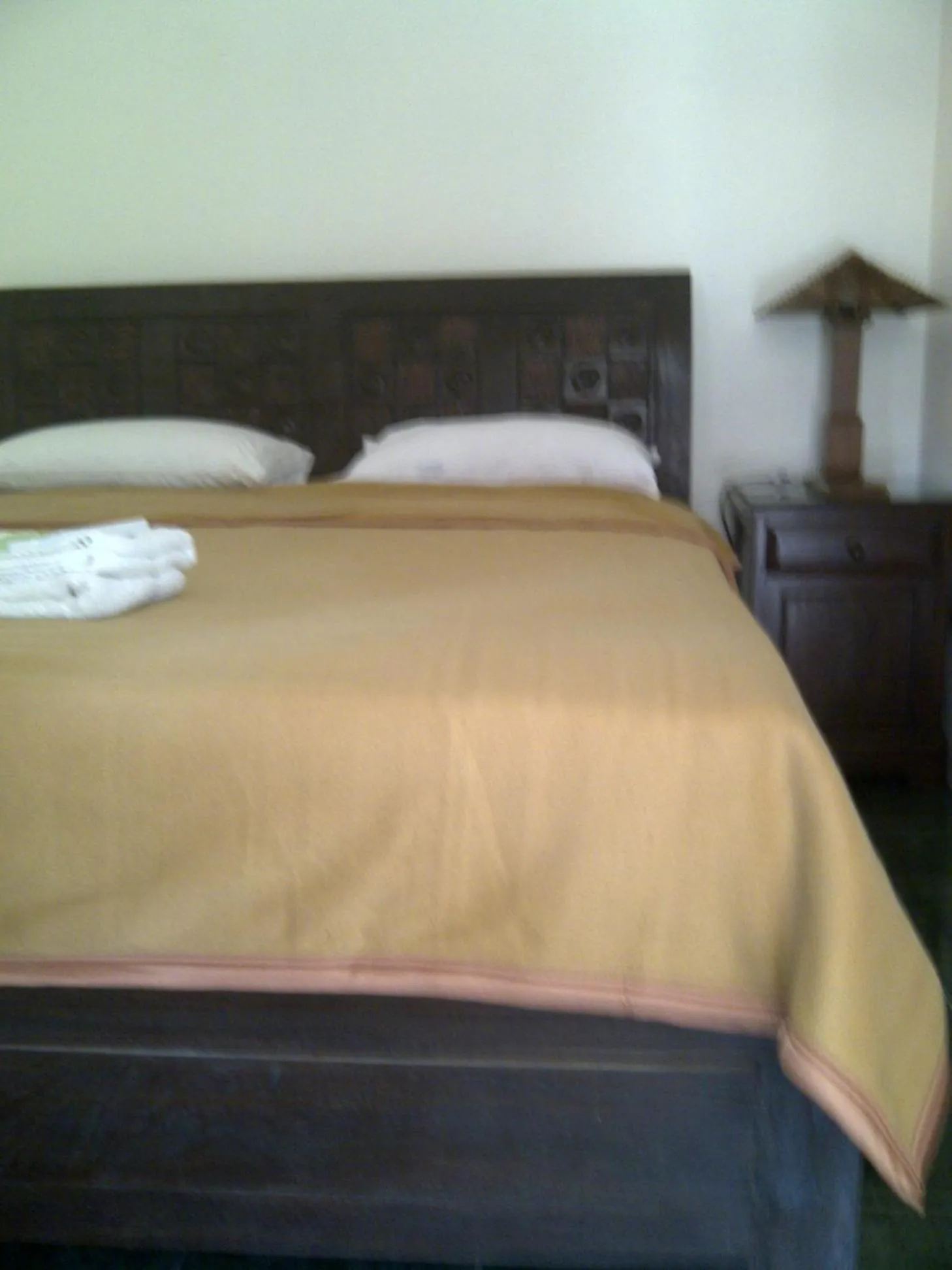Bed in Ndalem Suratin Guesthouse