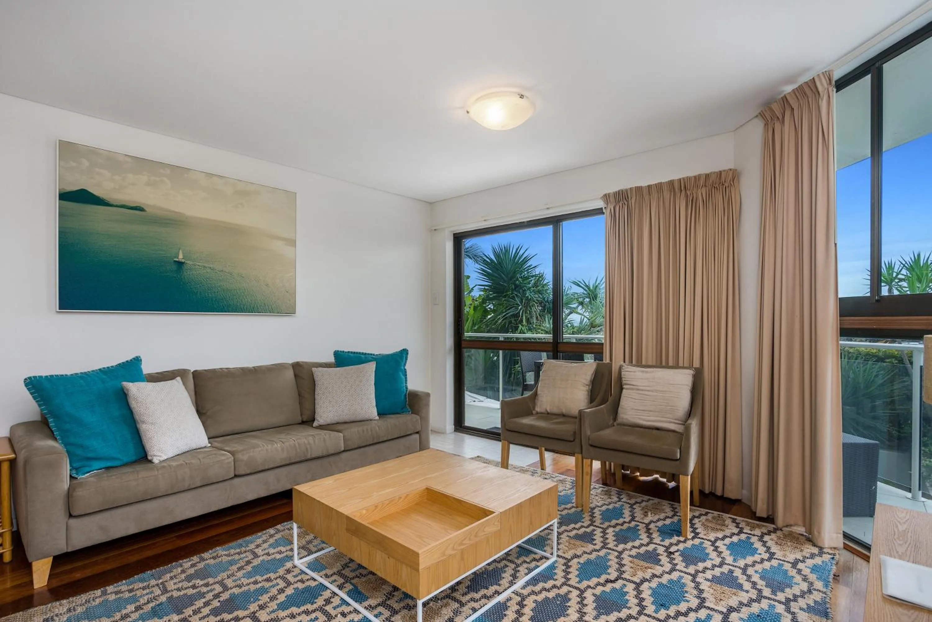 Living room in Bayview Beachfront Apartments, in town right on the beach