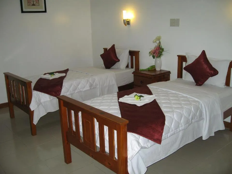 Bed in Sunrise Resort