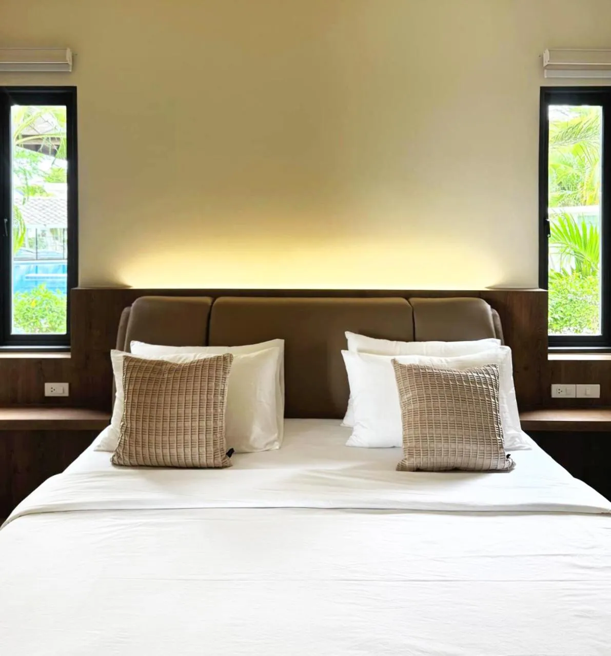 Bed in Sabaii Bay Resort