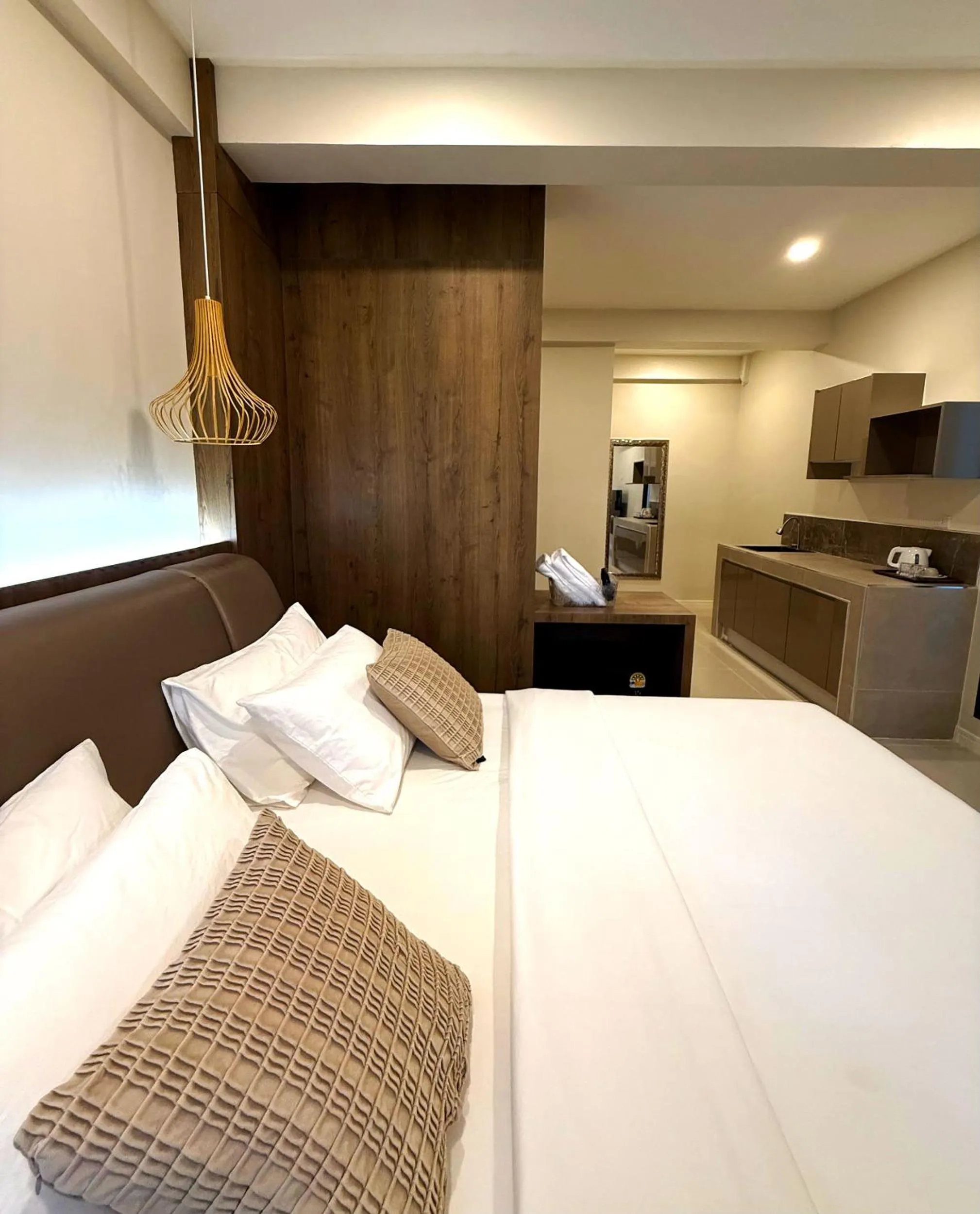 Bed in Sabaii Bay Resort