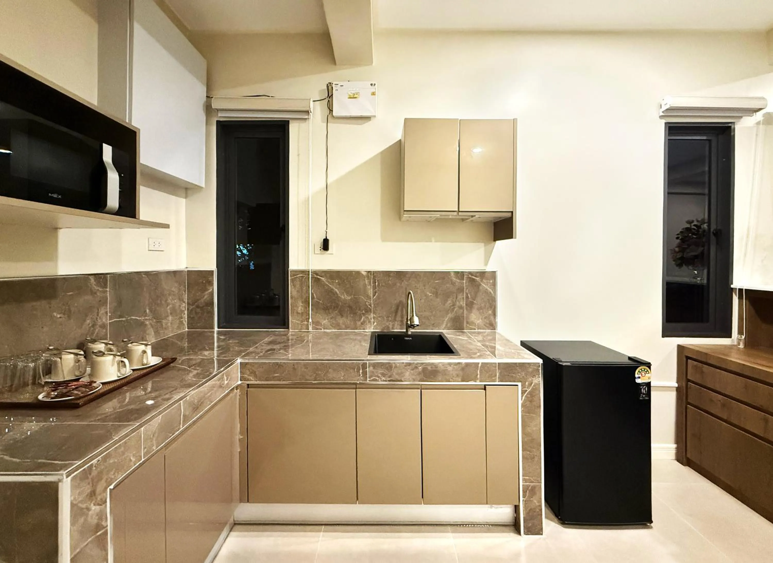 Kitchen or kitchenette in Sabaii Bay Resort