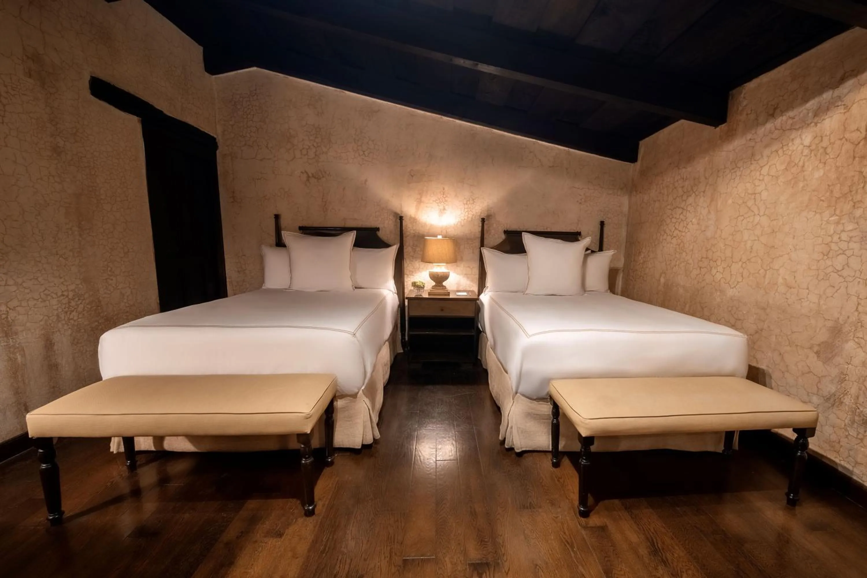 Bed in El Convento Boutique Hotel