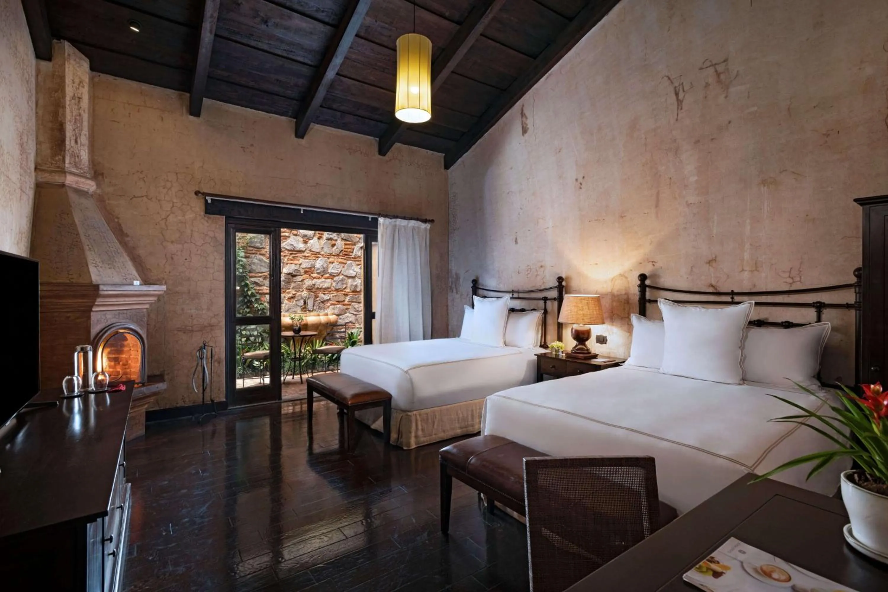 Bed in El Convento Boutique Hotel