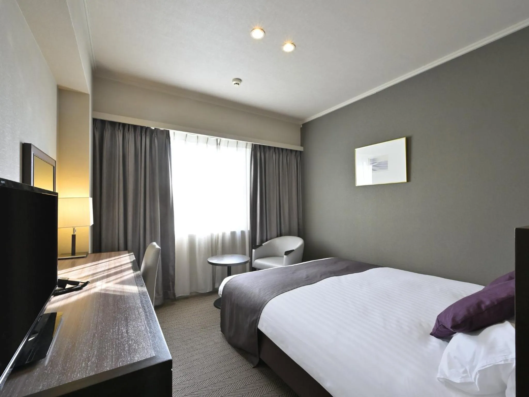 Photo of the whole room, Bed in Takamatsu Kokusai Hotel