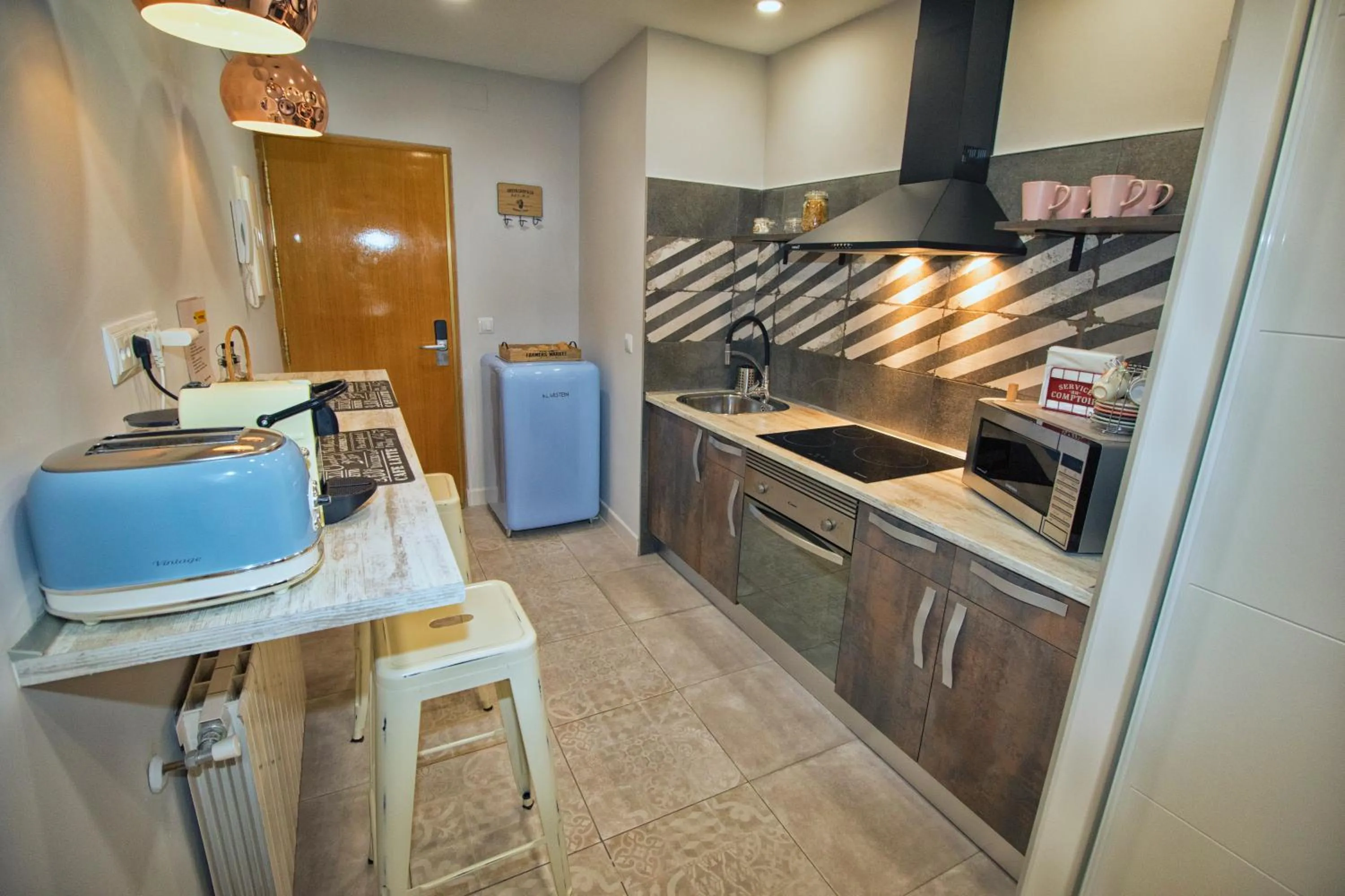 Kitchen or kitchenette in T-Homes - Cuenca