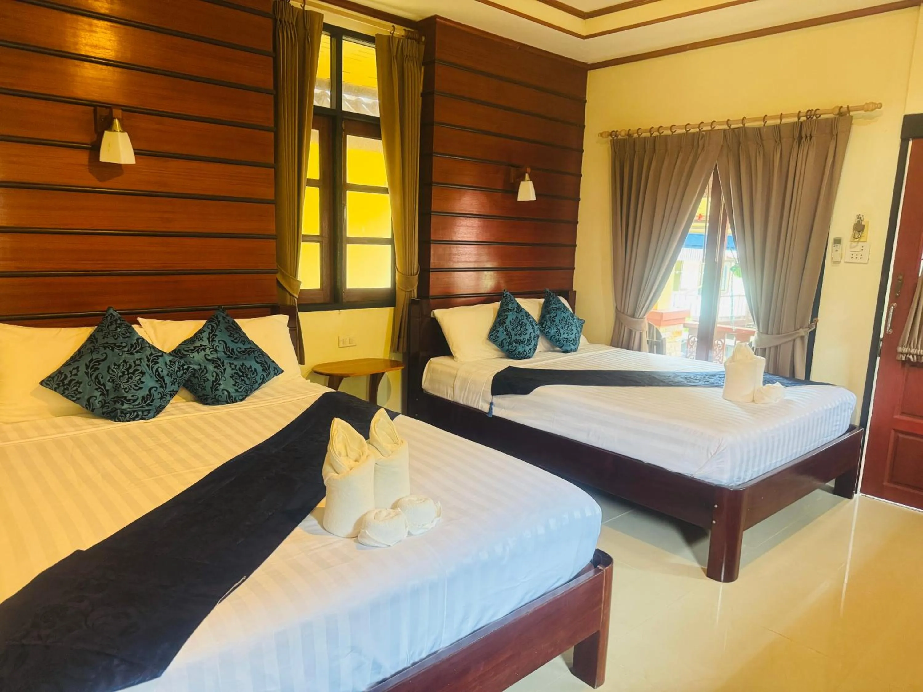 Bed in Starlight Haadrin Resort