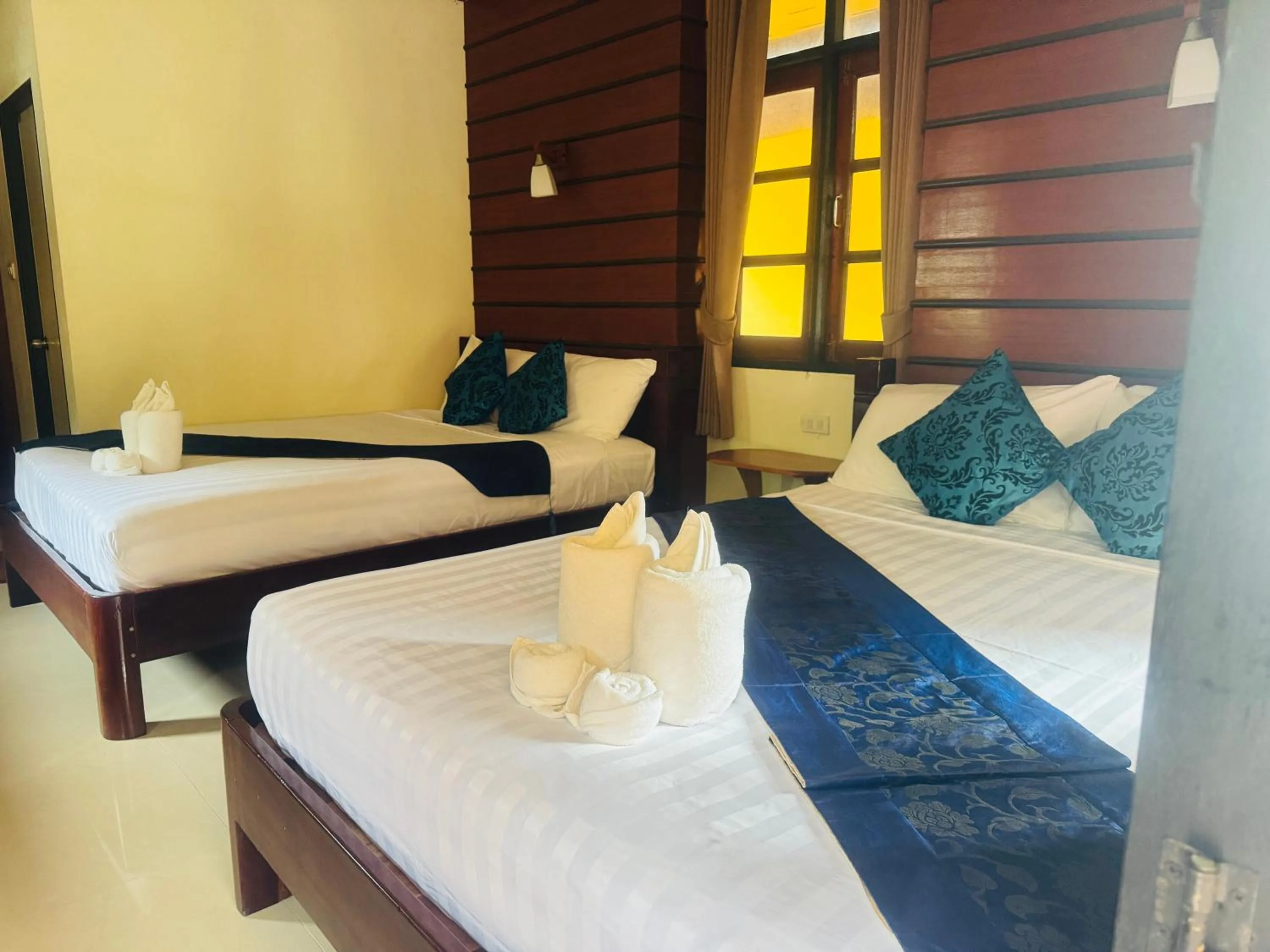 Bed in Starlight Haadrin Resort