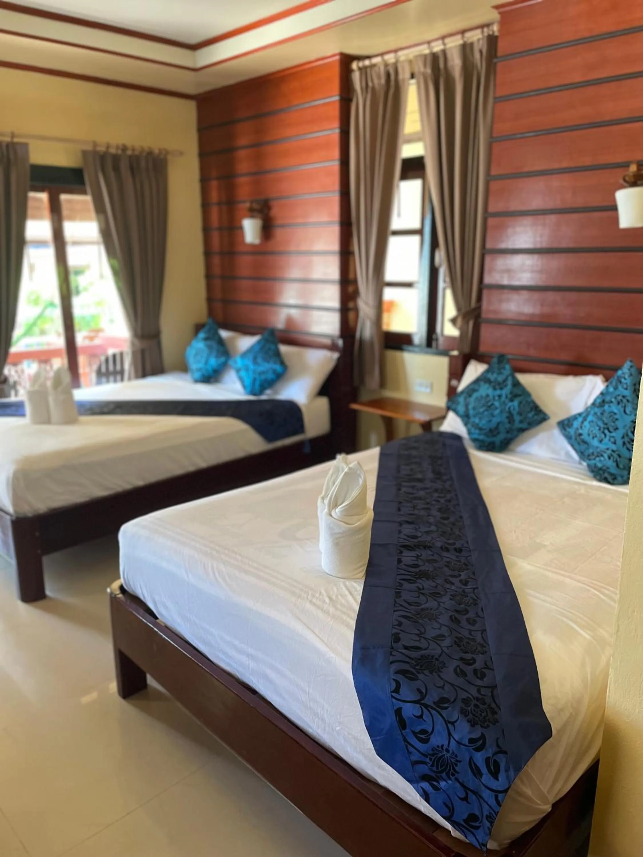 Bed in Starlight Haadrin Resort