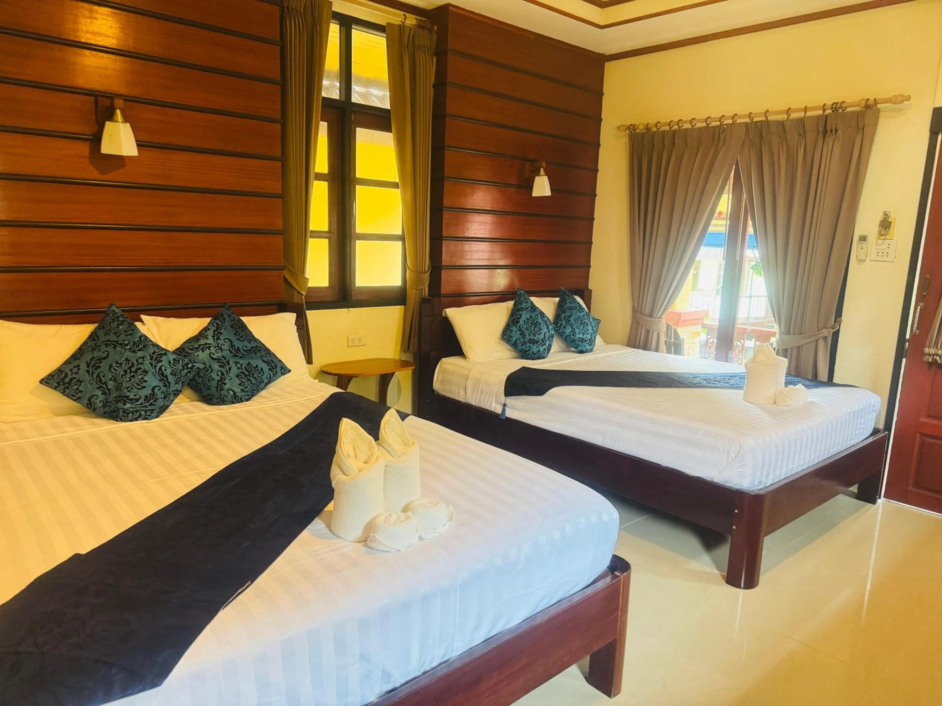 Bed in Starlight Haadrin Resort