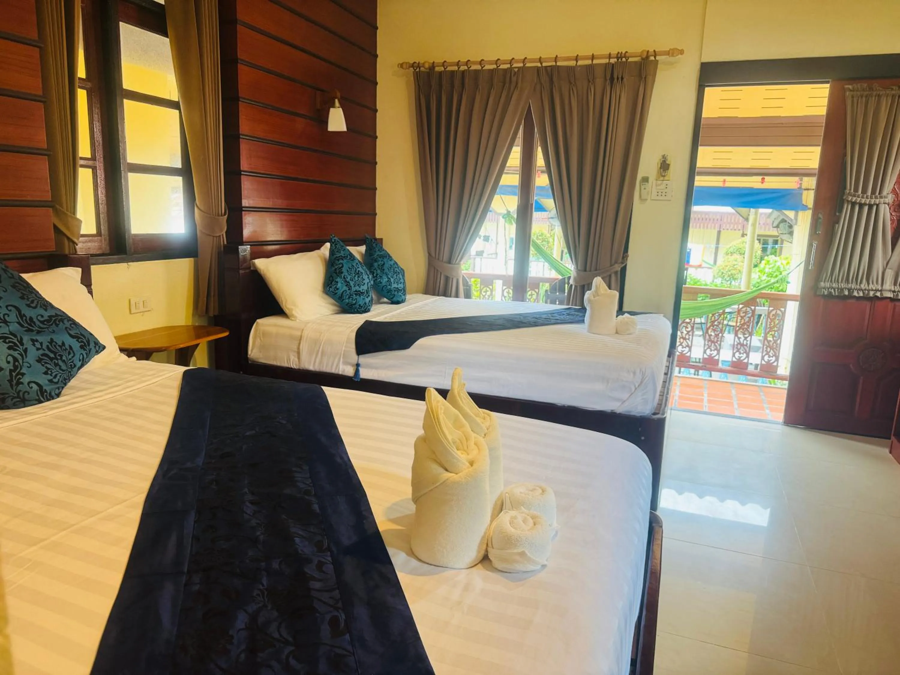 Bed in Starlight Haadrin Resort