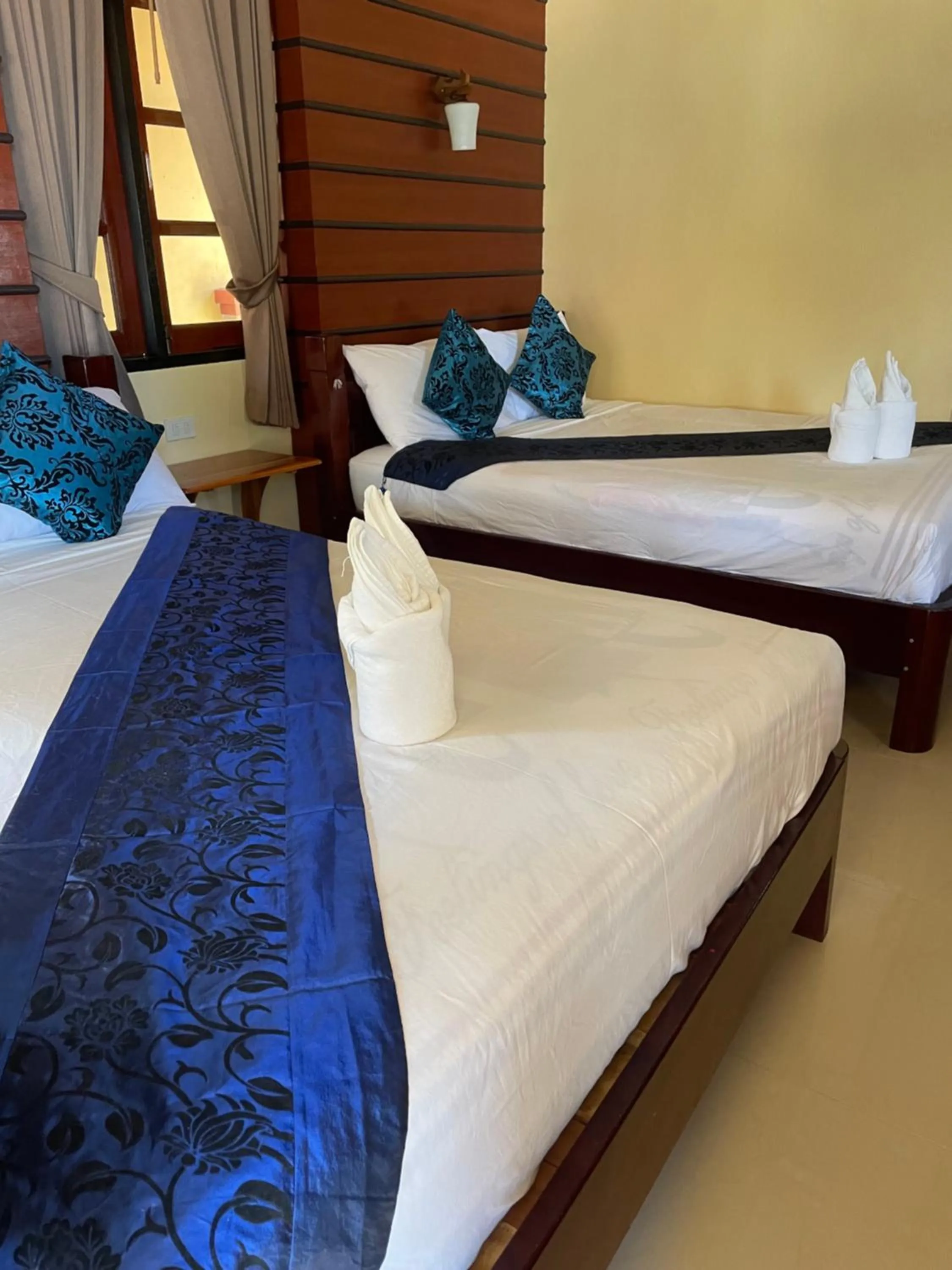 Bed in Starlight Haadrin Resort