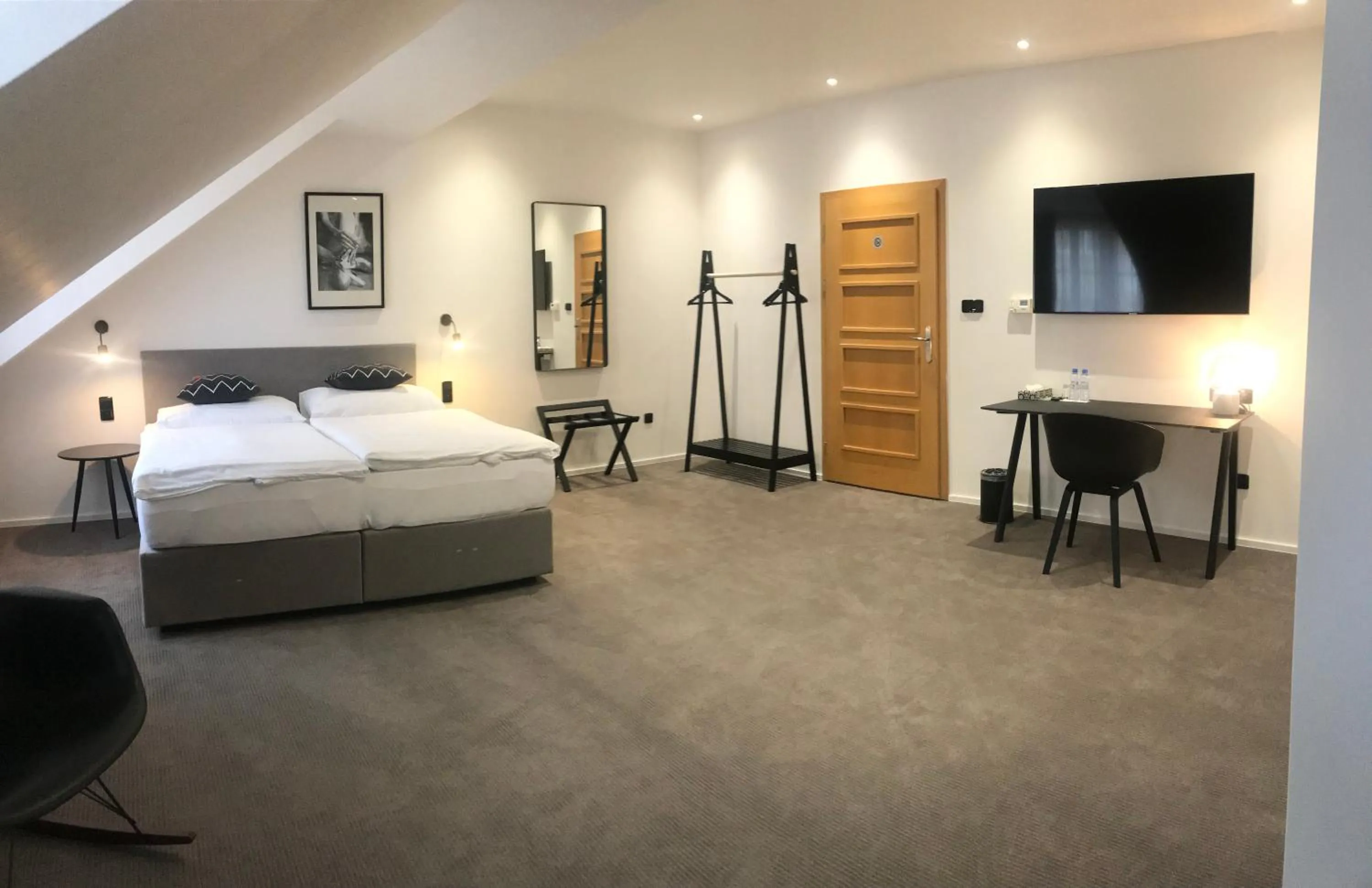 Living room, Bed in Rozmaryn Hotel B&B