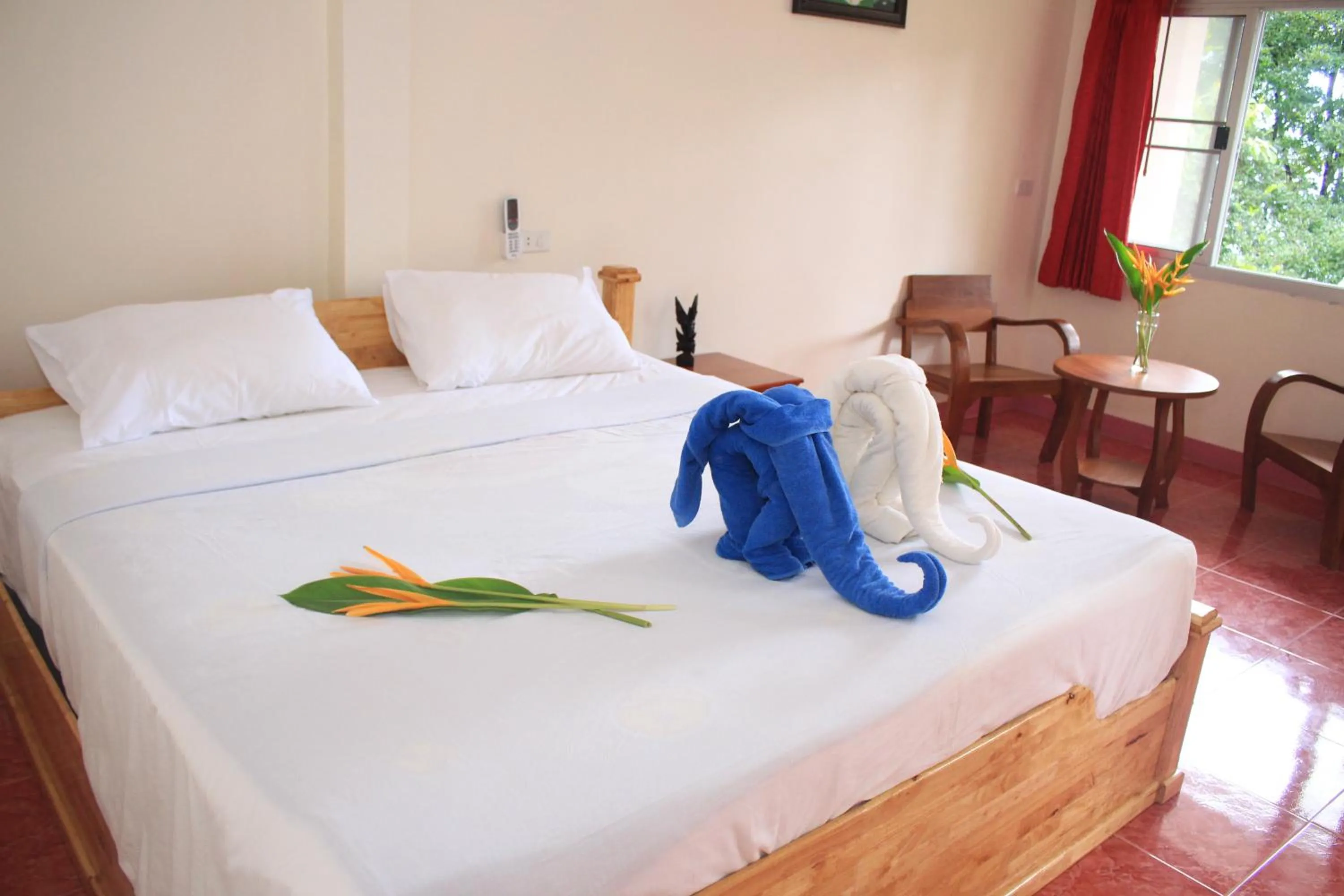 Bed in Dragon Hut Resort