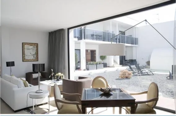 Living room, Bed in Hotel Mar d'Espills - Adults Only