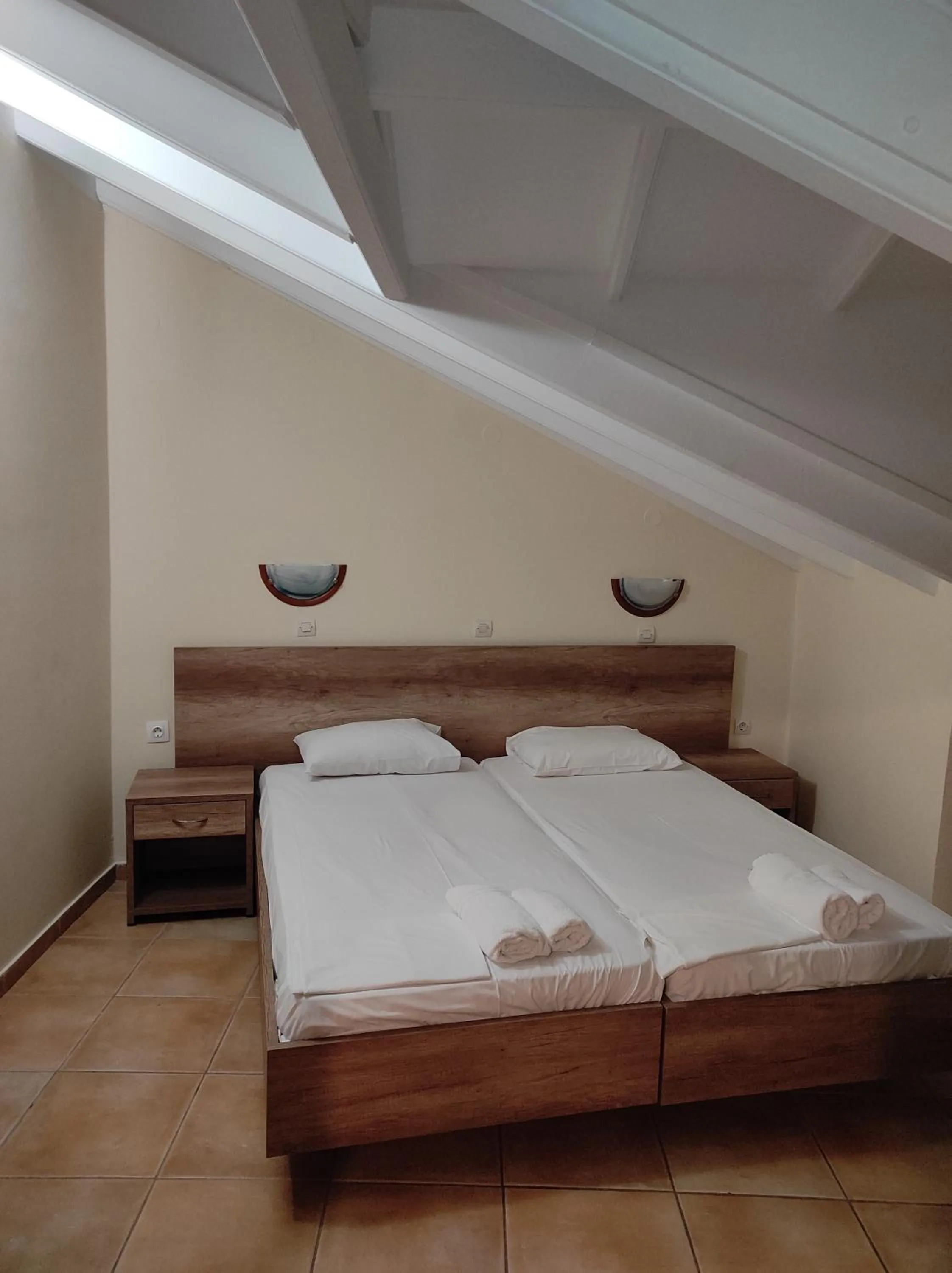 Bed in Kavos Plaza Hotel