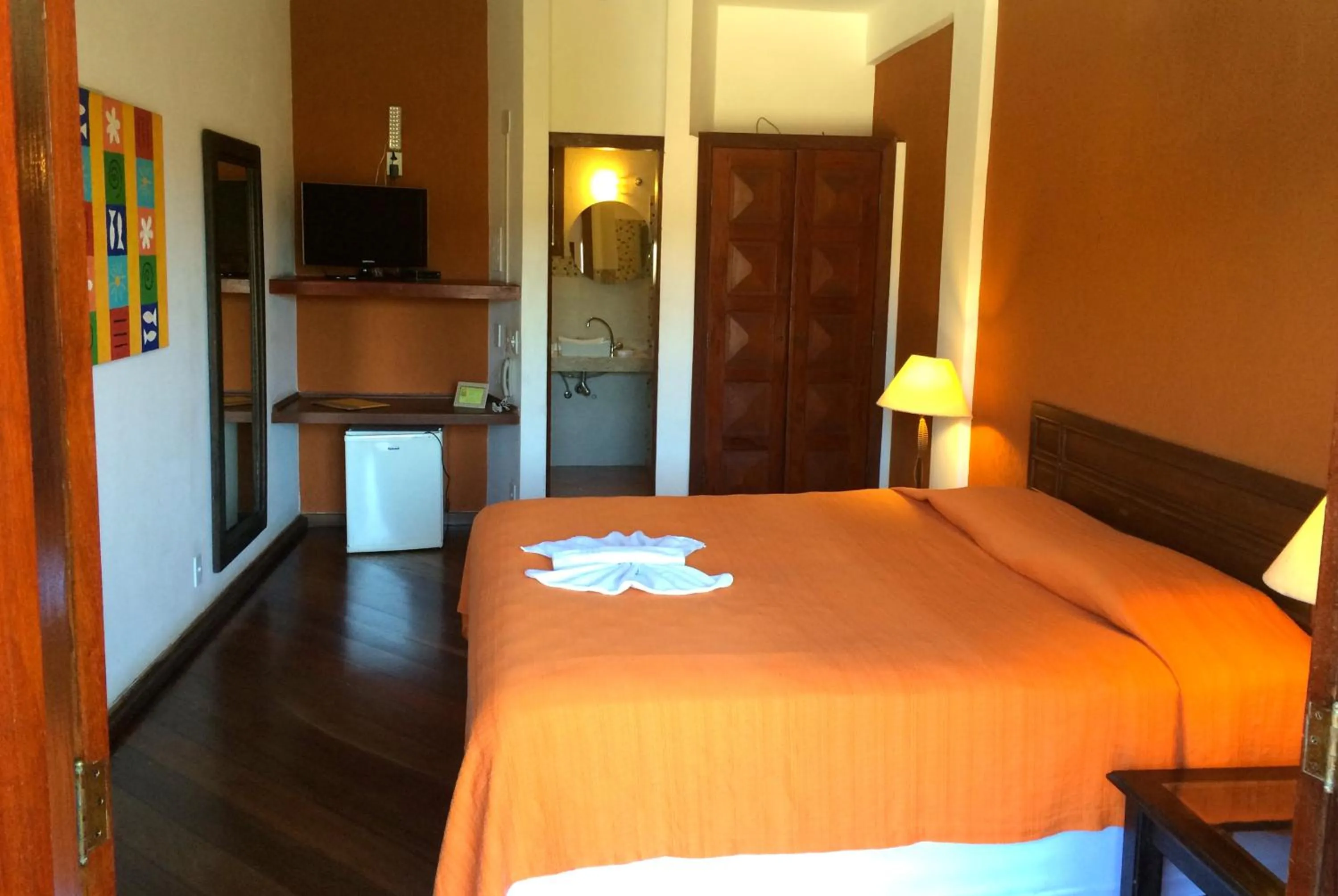 Bed in Pousada Caminho do Sol