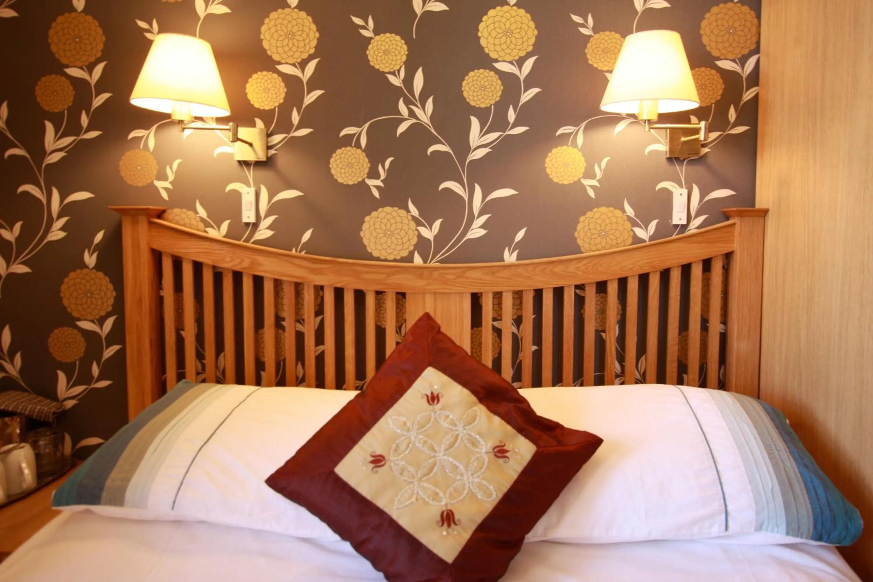 Bed in Brentwood Guest House