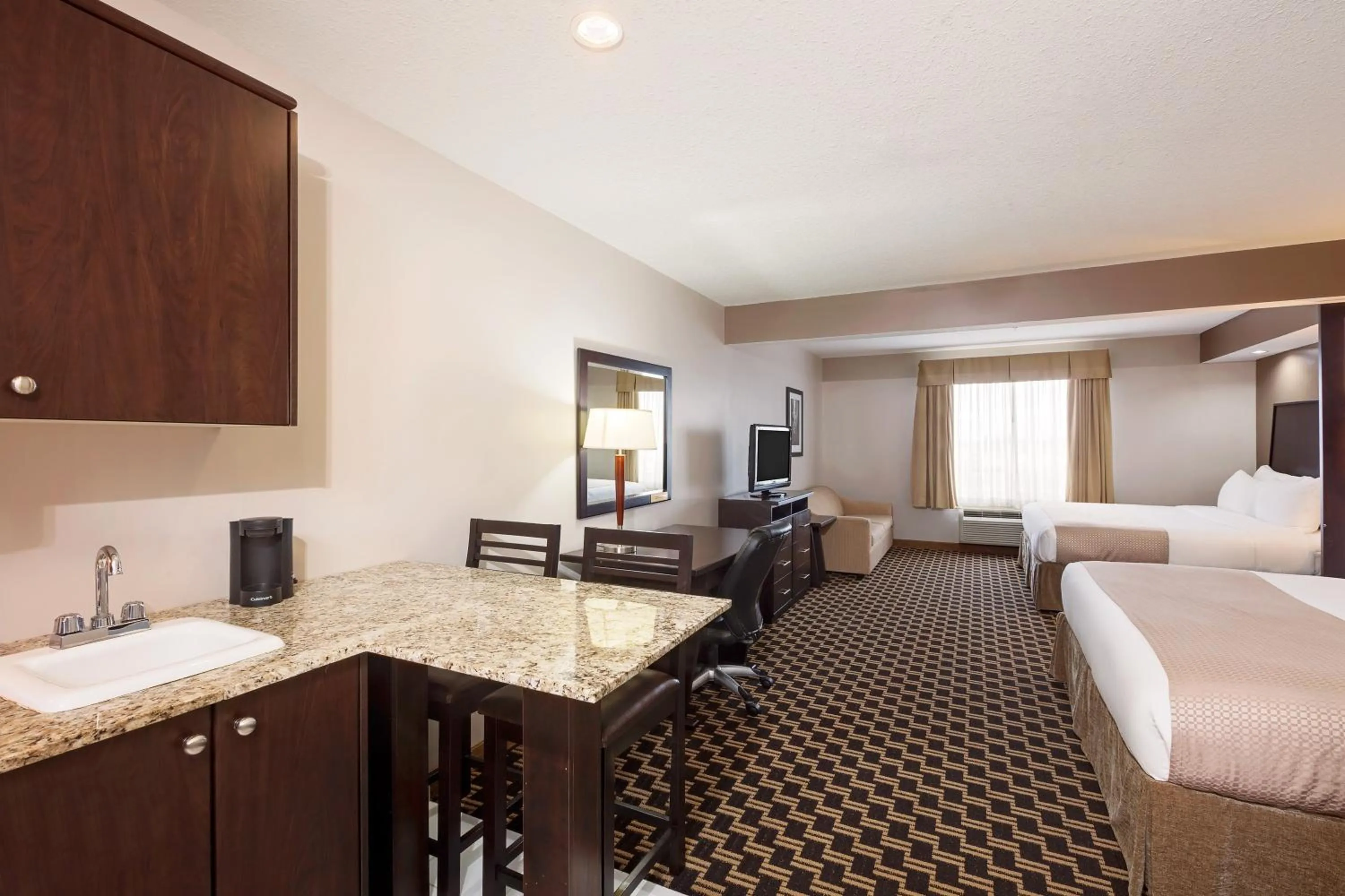 Coffee/tea facilities, Bed in Ramada by Wyndham Cold Lake