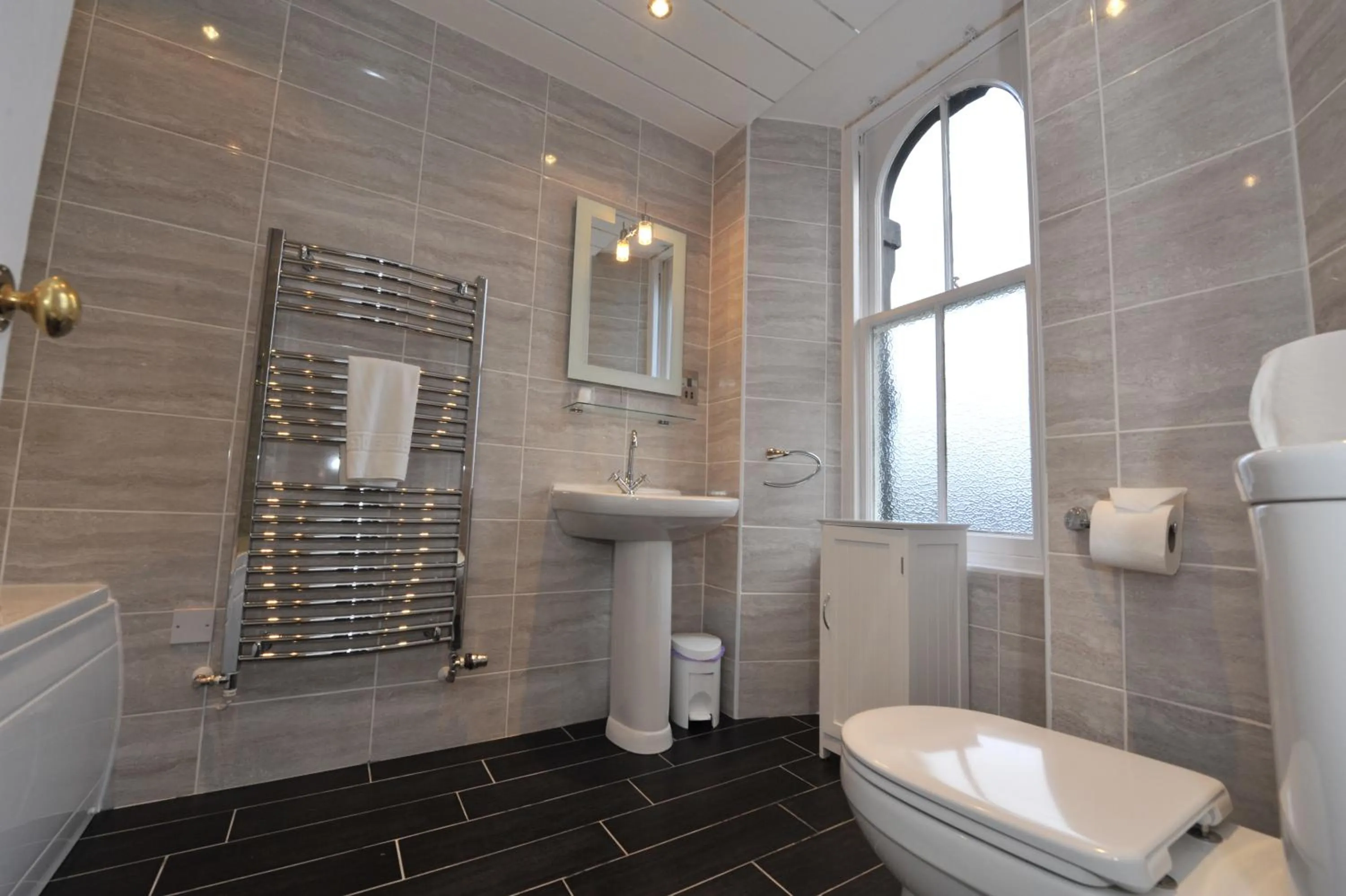 Bathroom in Poppies Hotel