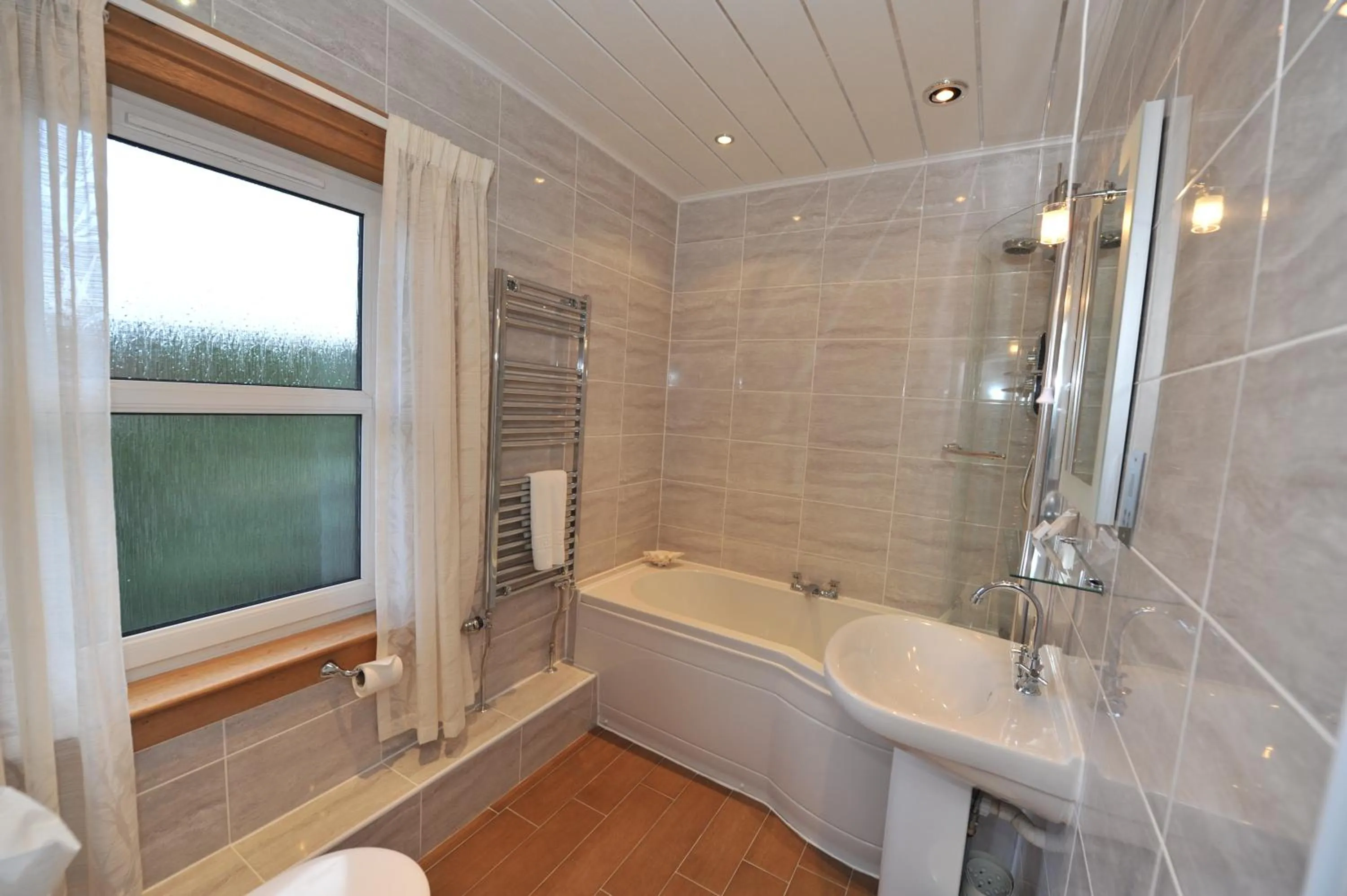 Bathroom in Poppies Hotel