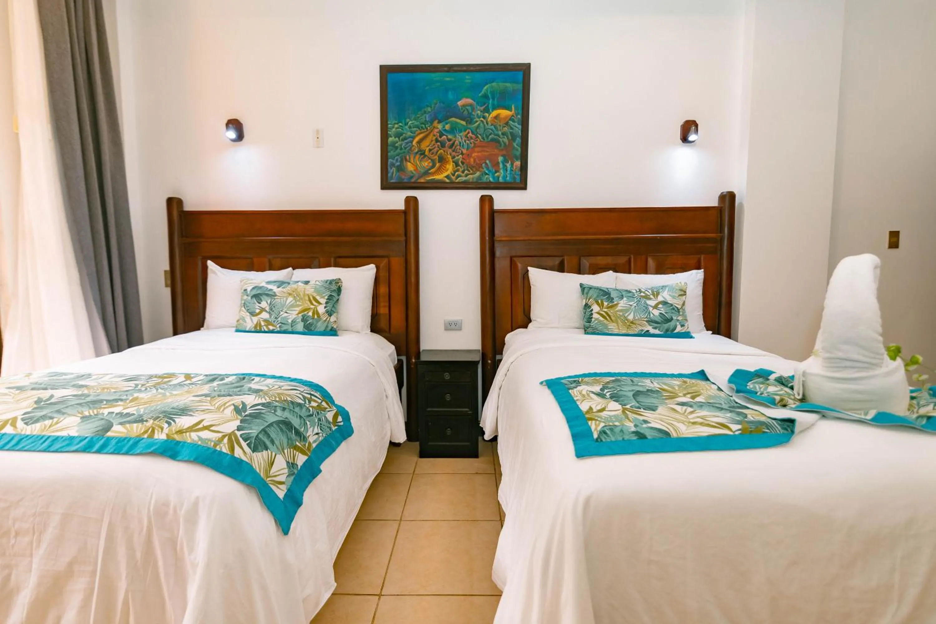 Photo of the whole room, Bed in Hotel San Bada Resort & Spa