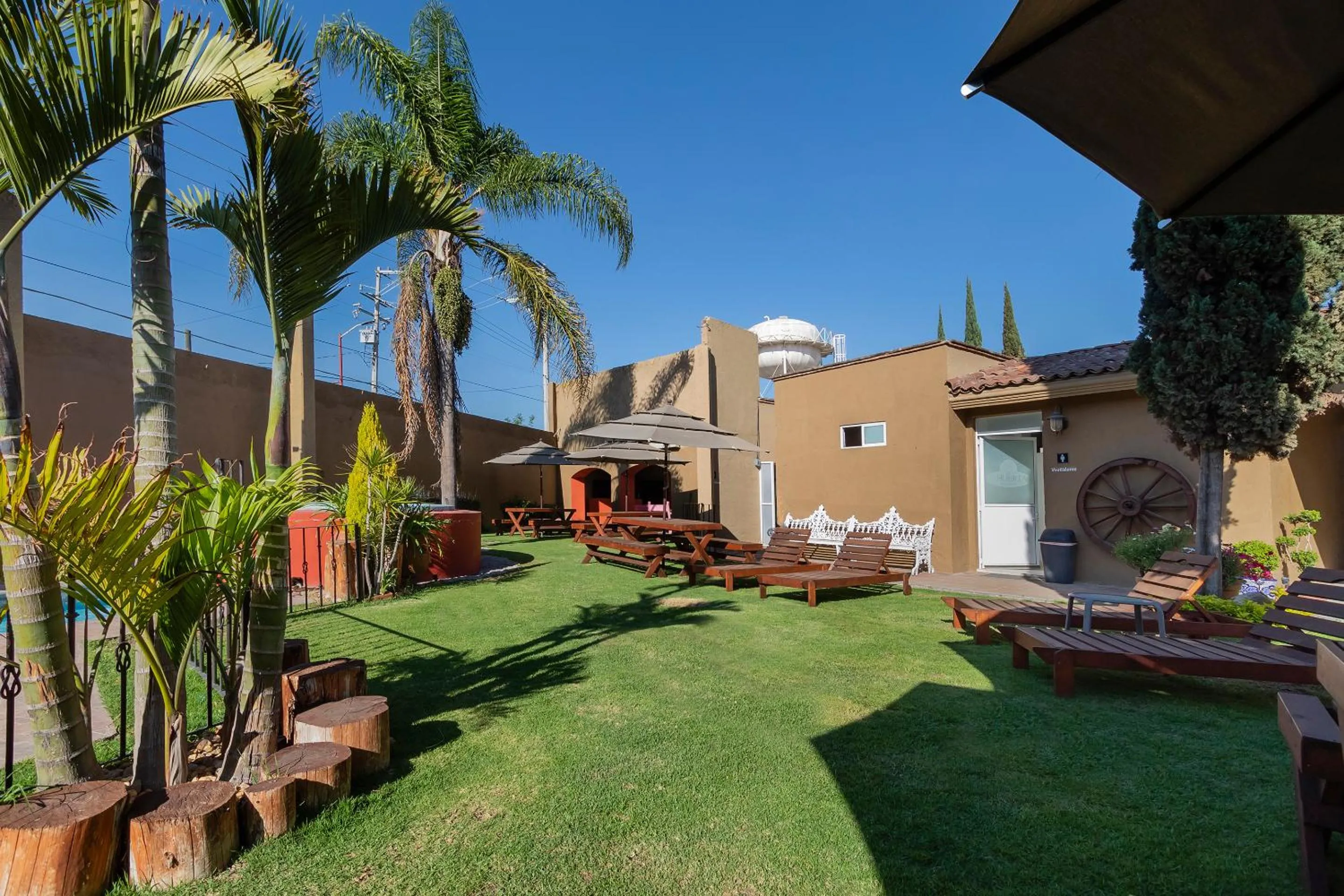 Property building in Capital O Hotel La Huerta Golf & Hotel, Cholula