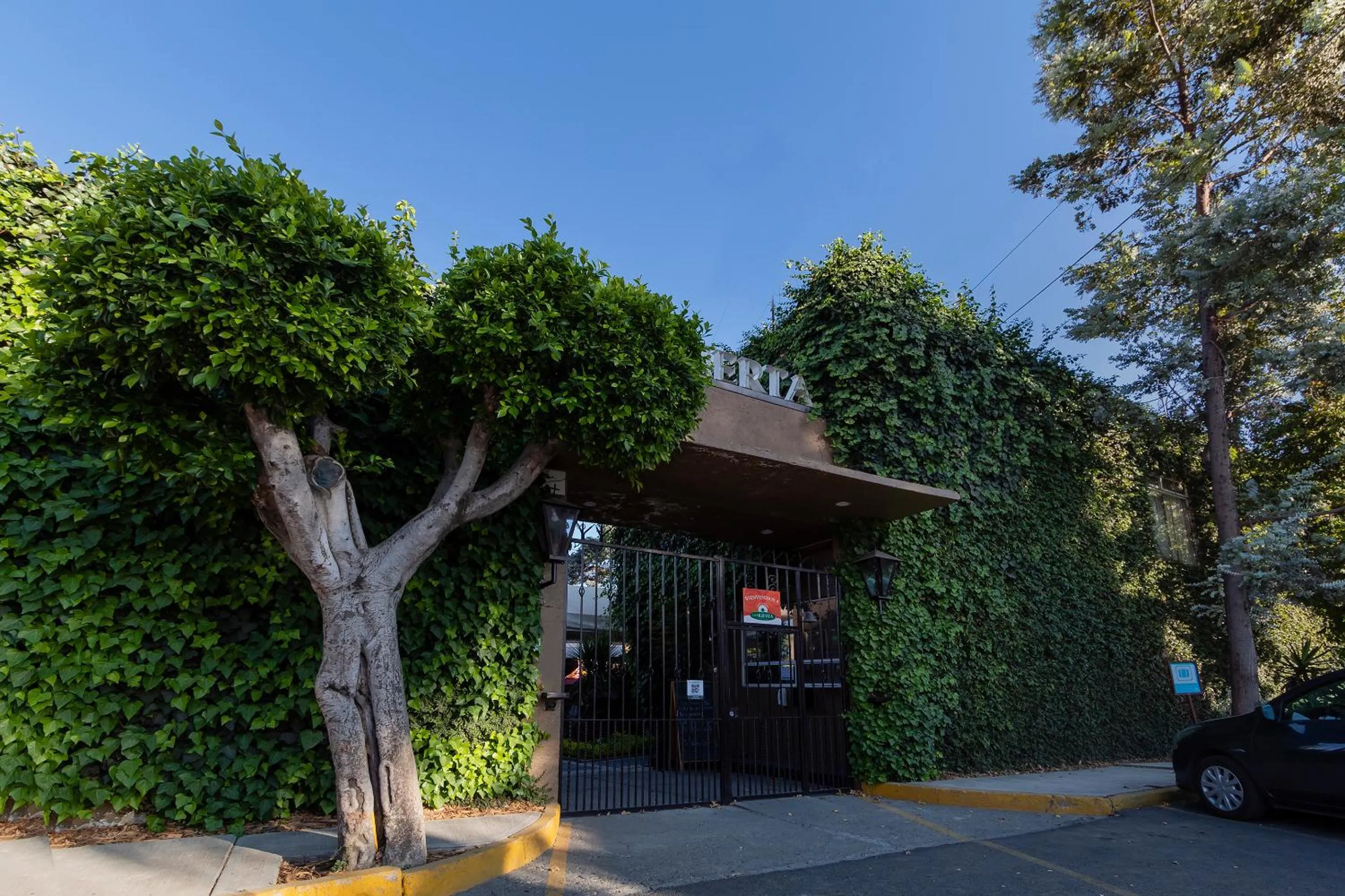 Property building in Capital O Hotel La Huerta Golf & Hotel, Cholula