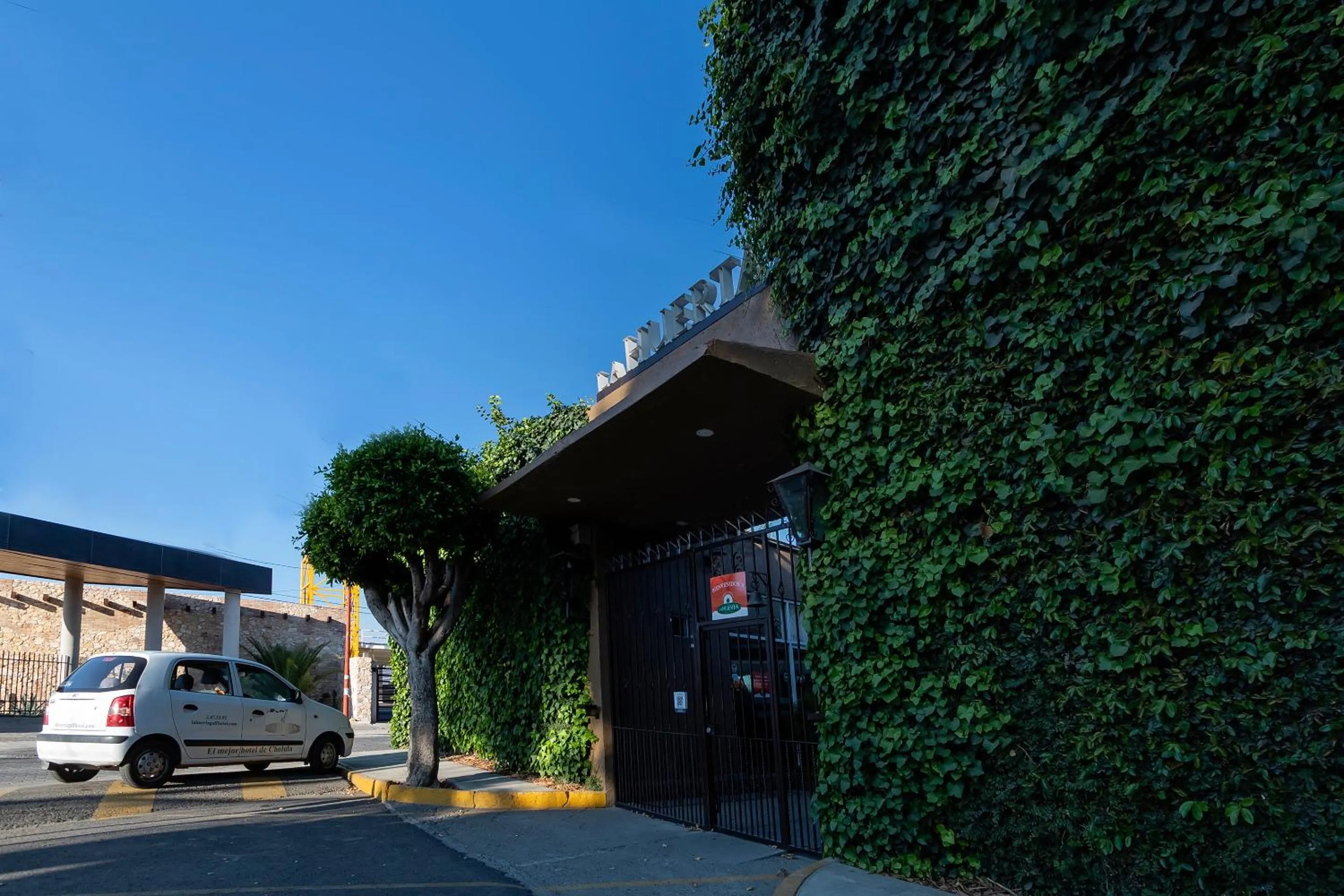 Property building in Capital O Hotel La Huerta Golf & Hotel, Cholula