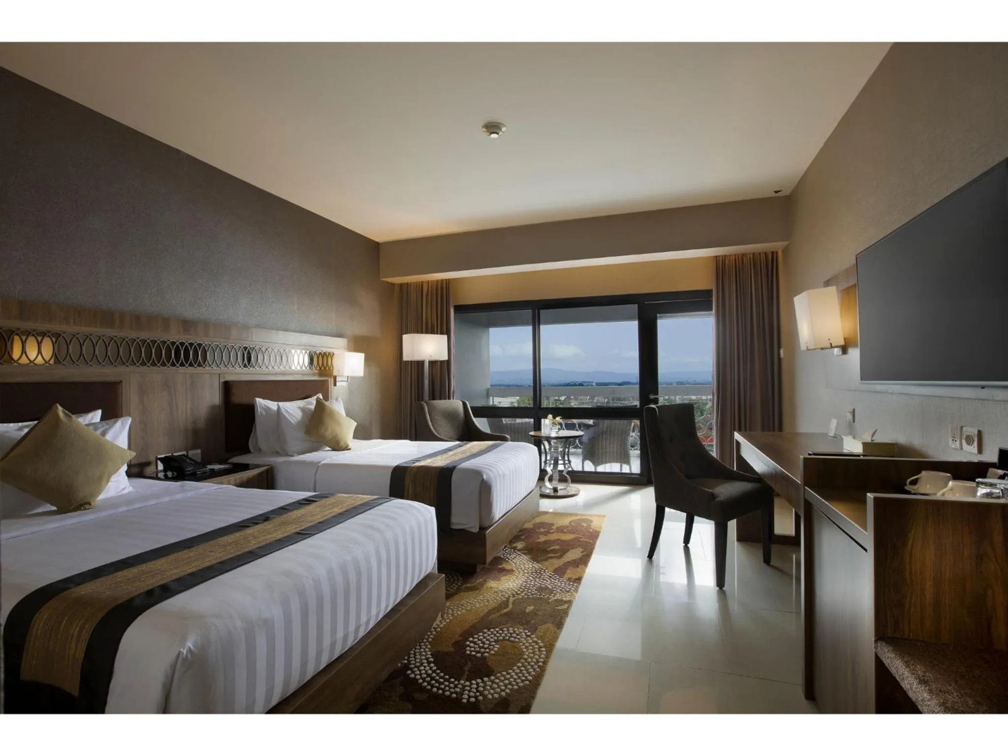 Bed in Royal Ambarrukmo Yogyakarta