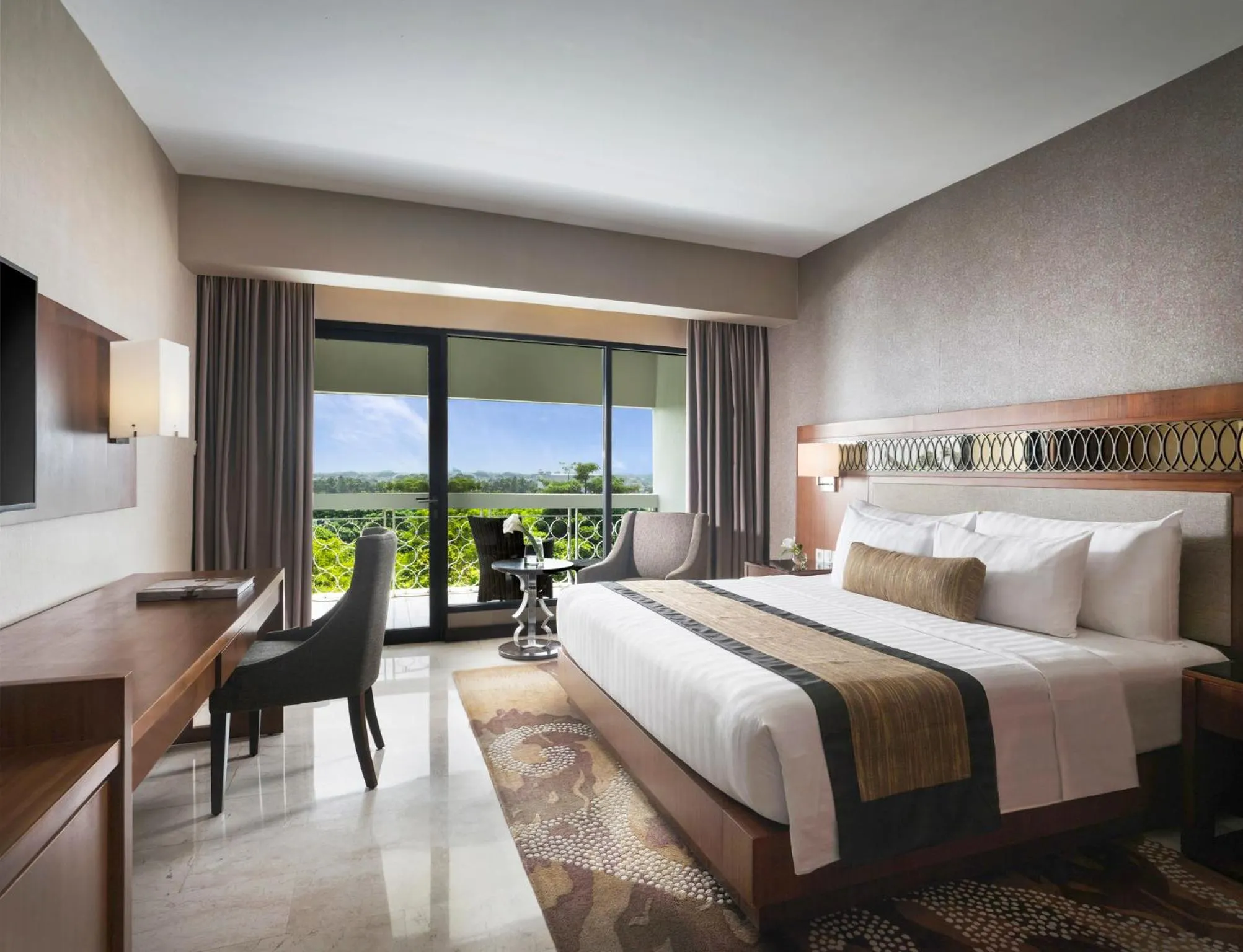 Bed in Royal Ambarrukmo Yogyakarta