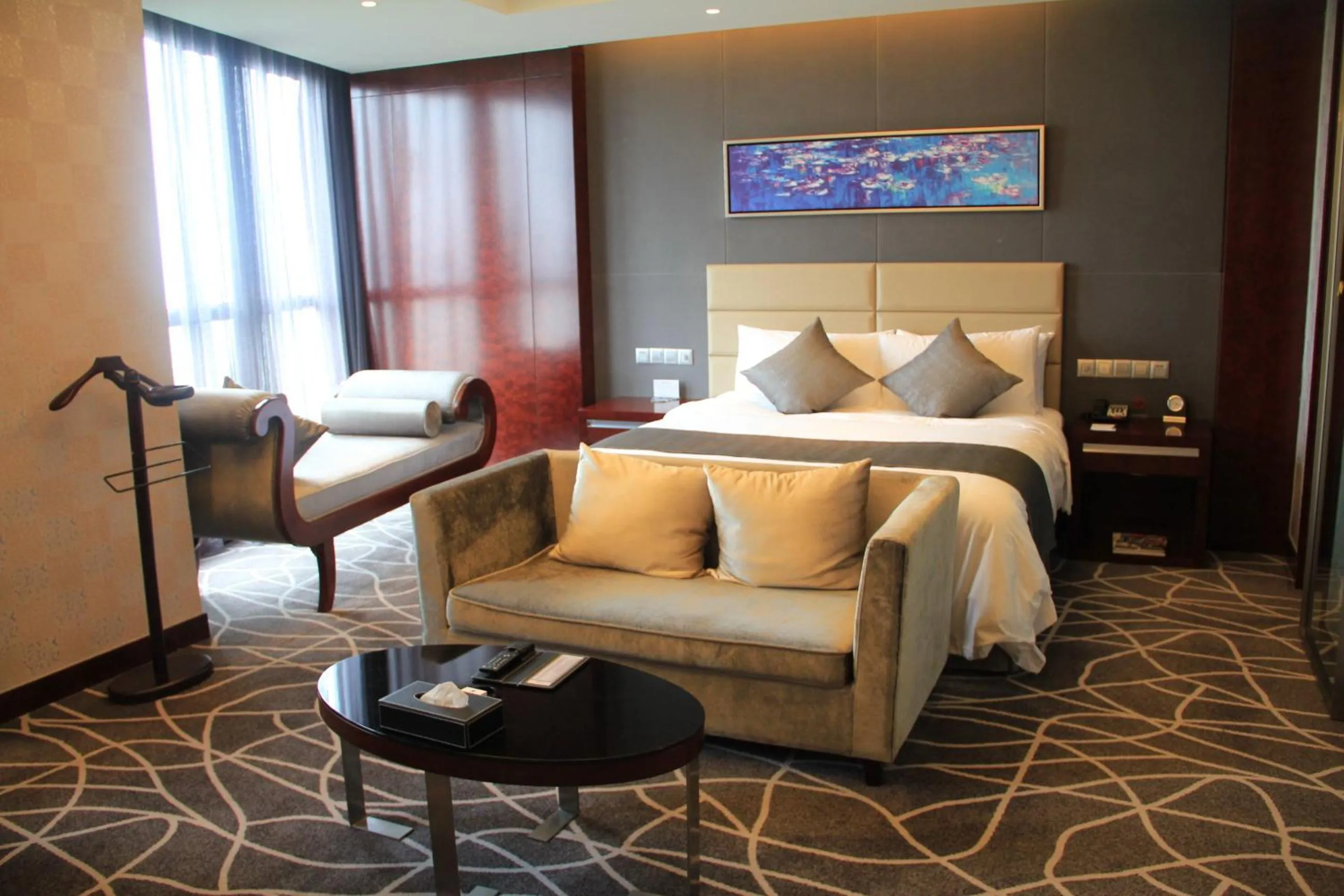 Bedroom in Grand Metropark Universal Dinosaur Town Hotel