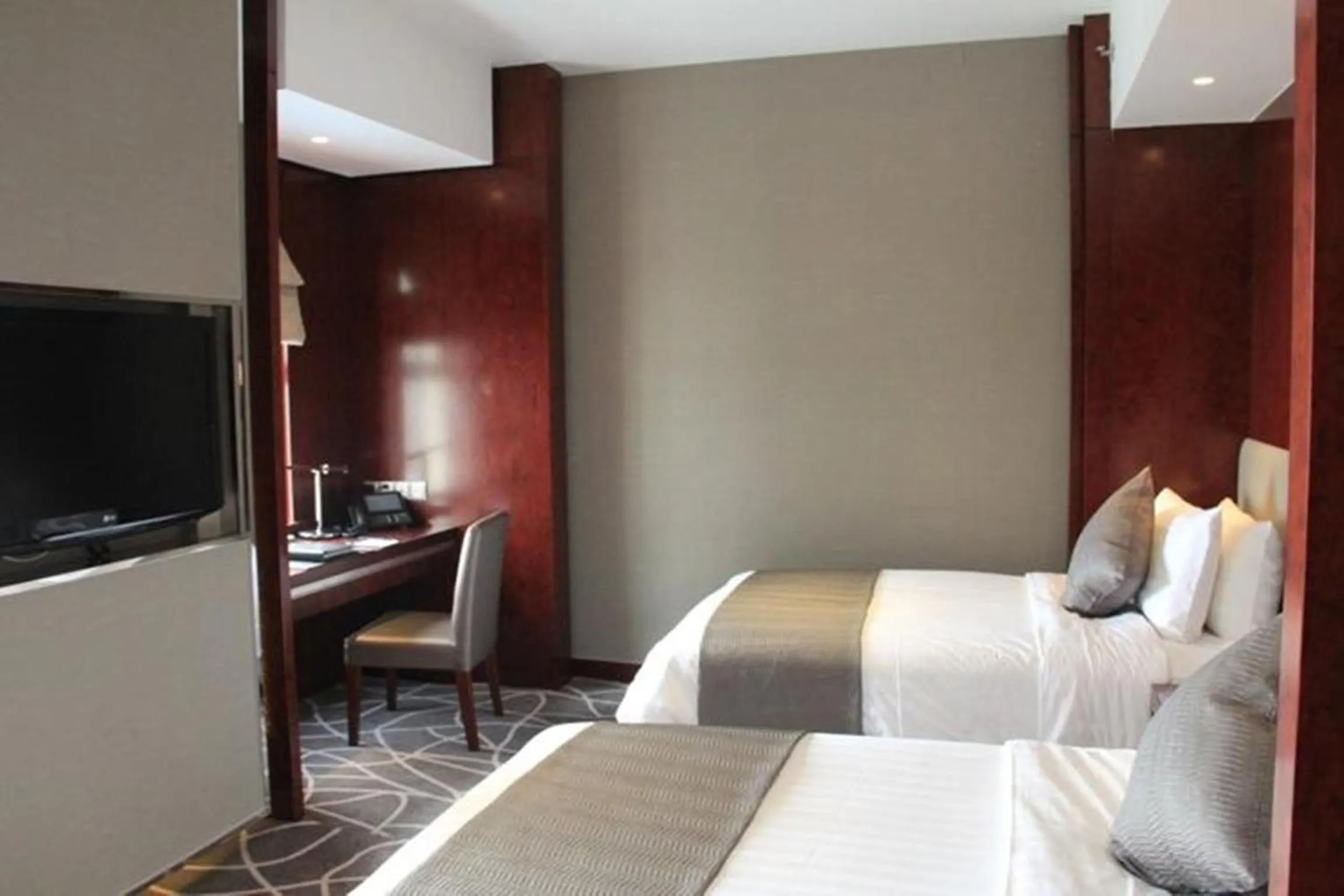 Bedroom in Grand Metropark Universal Dinosaur Town Hotel