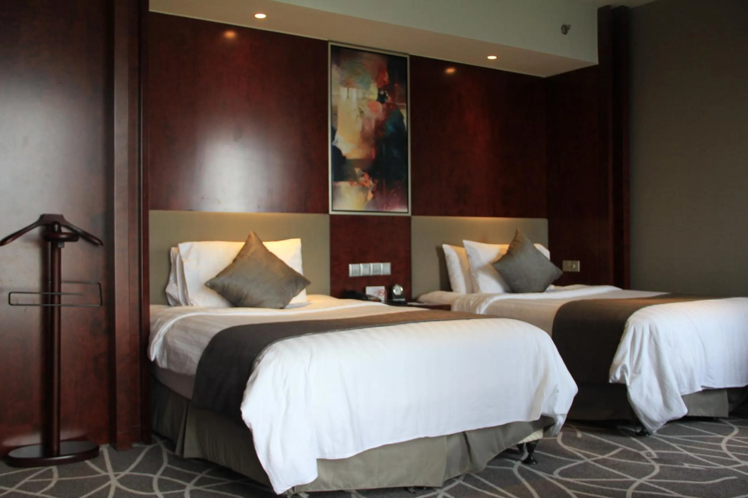 Bedroom in Grand Metropark Universal Dinosaur Town Hotel