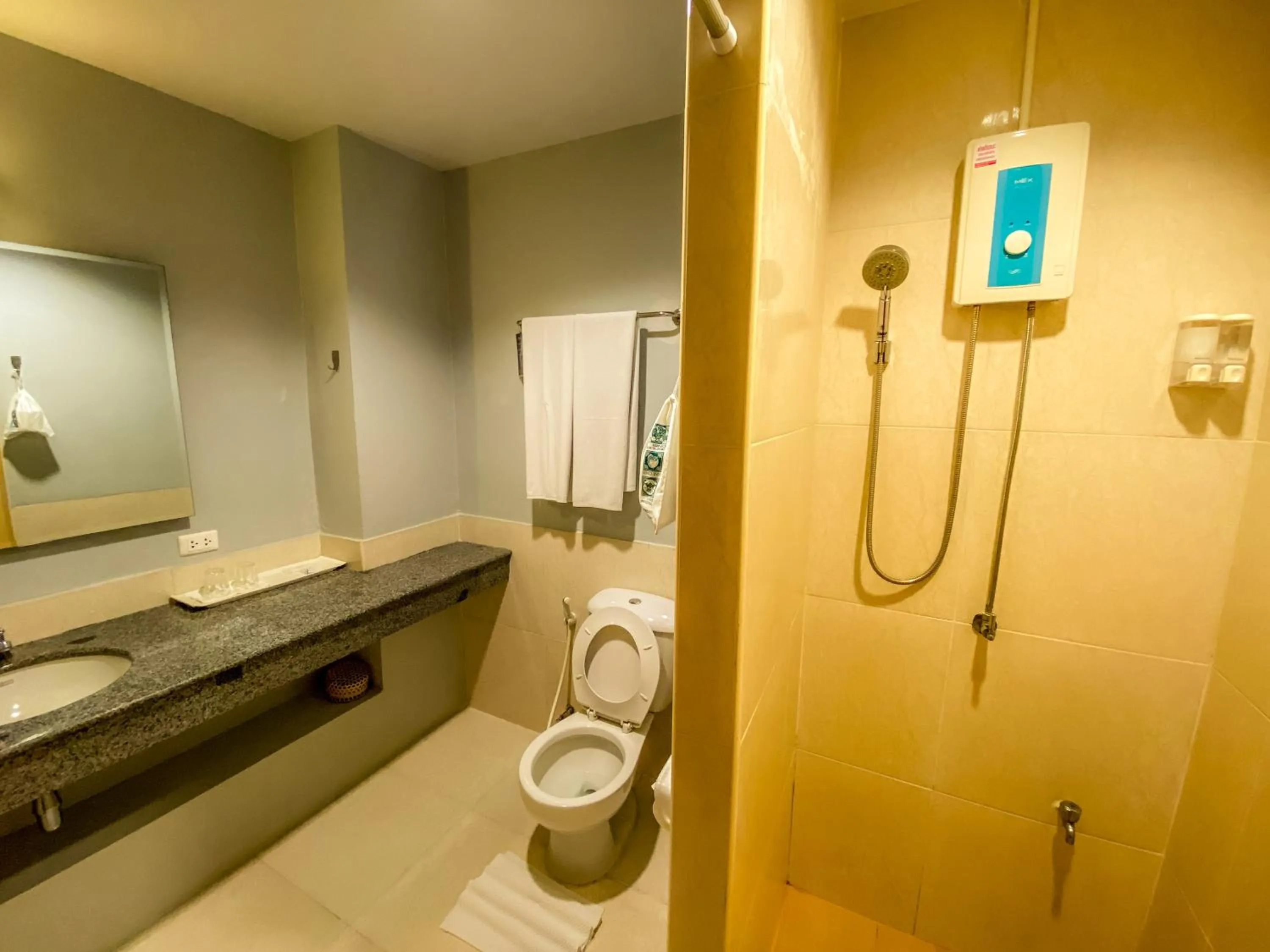 Toilet in Sino Inn Phuket Hotel - SHA Plus